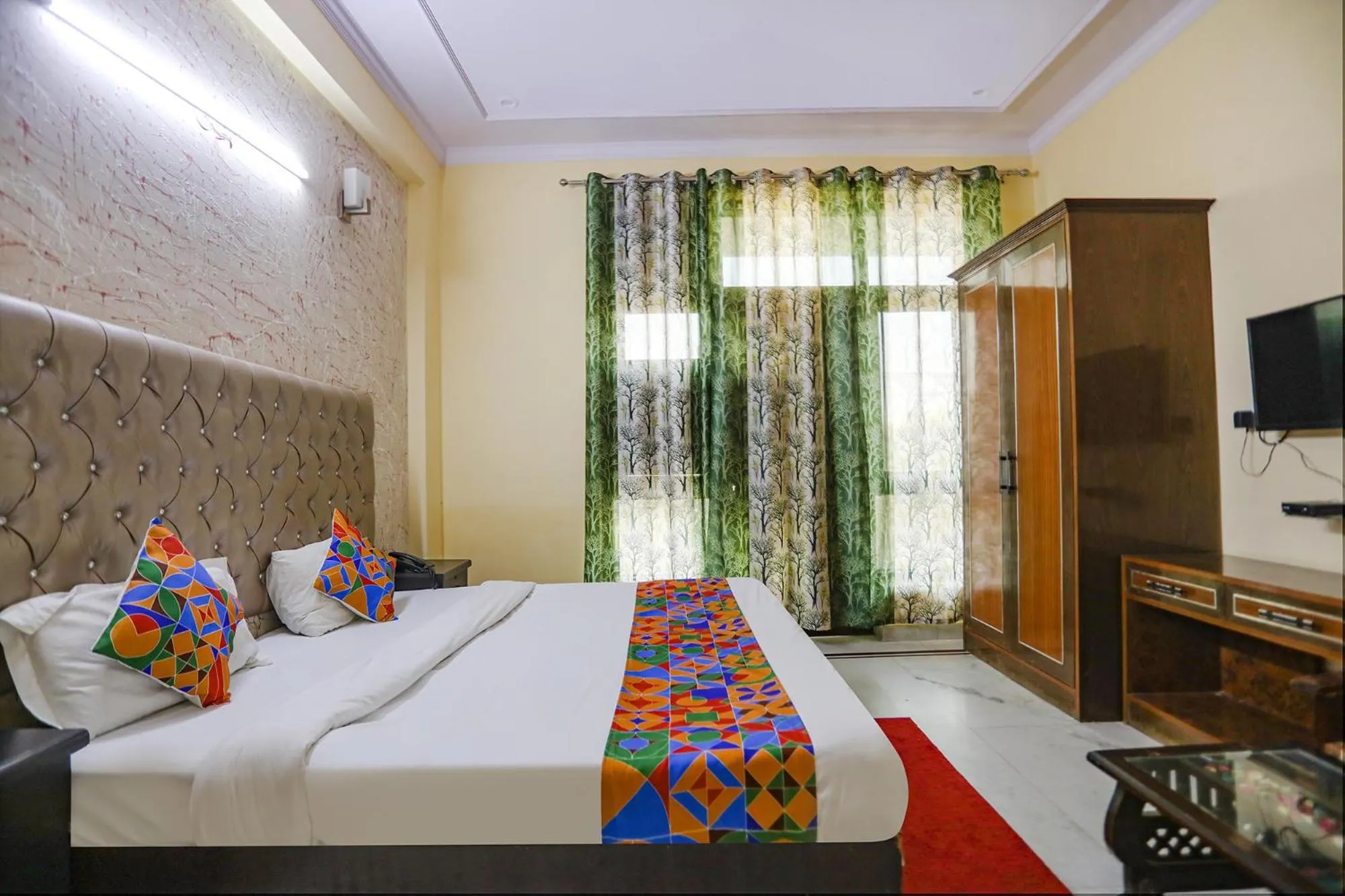 Bed in FabHotel HM Palace