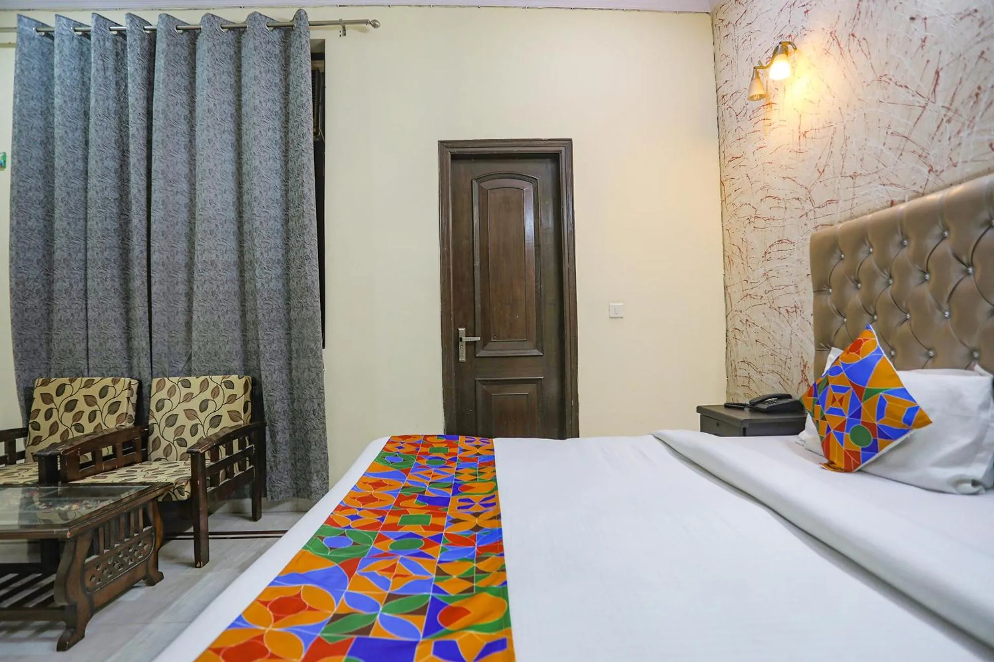 Bed in FabHotel HM Palace