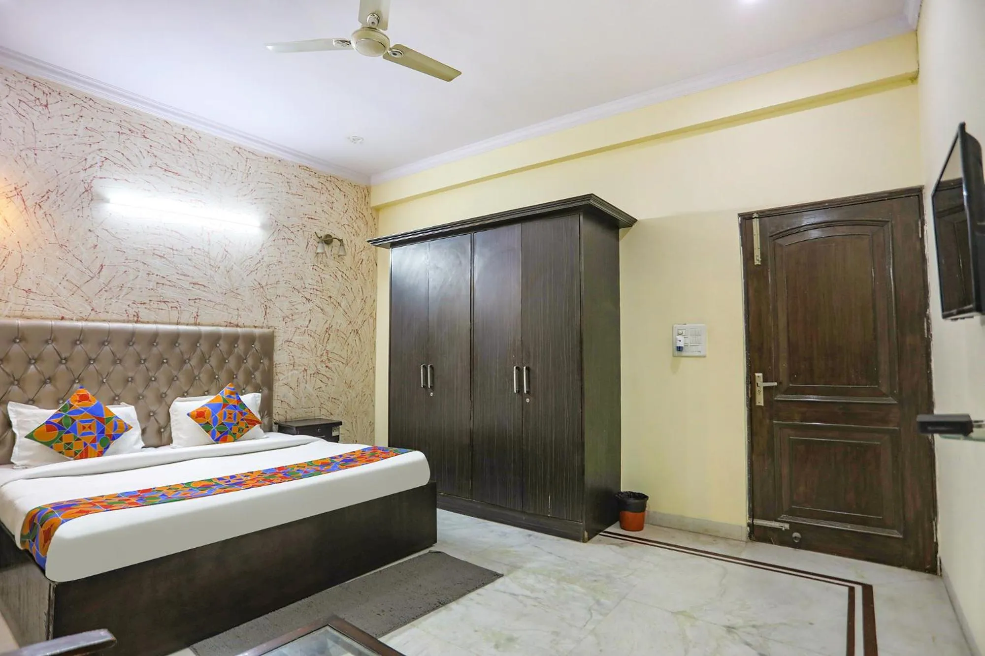 Bed in FabHotel HM Palace