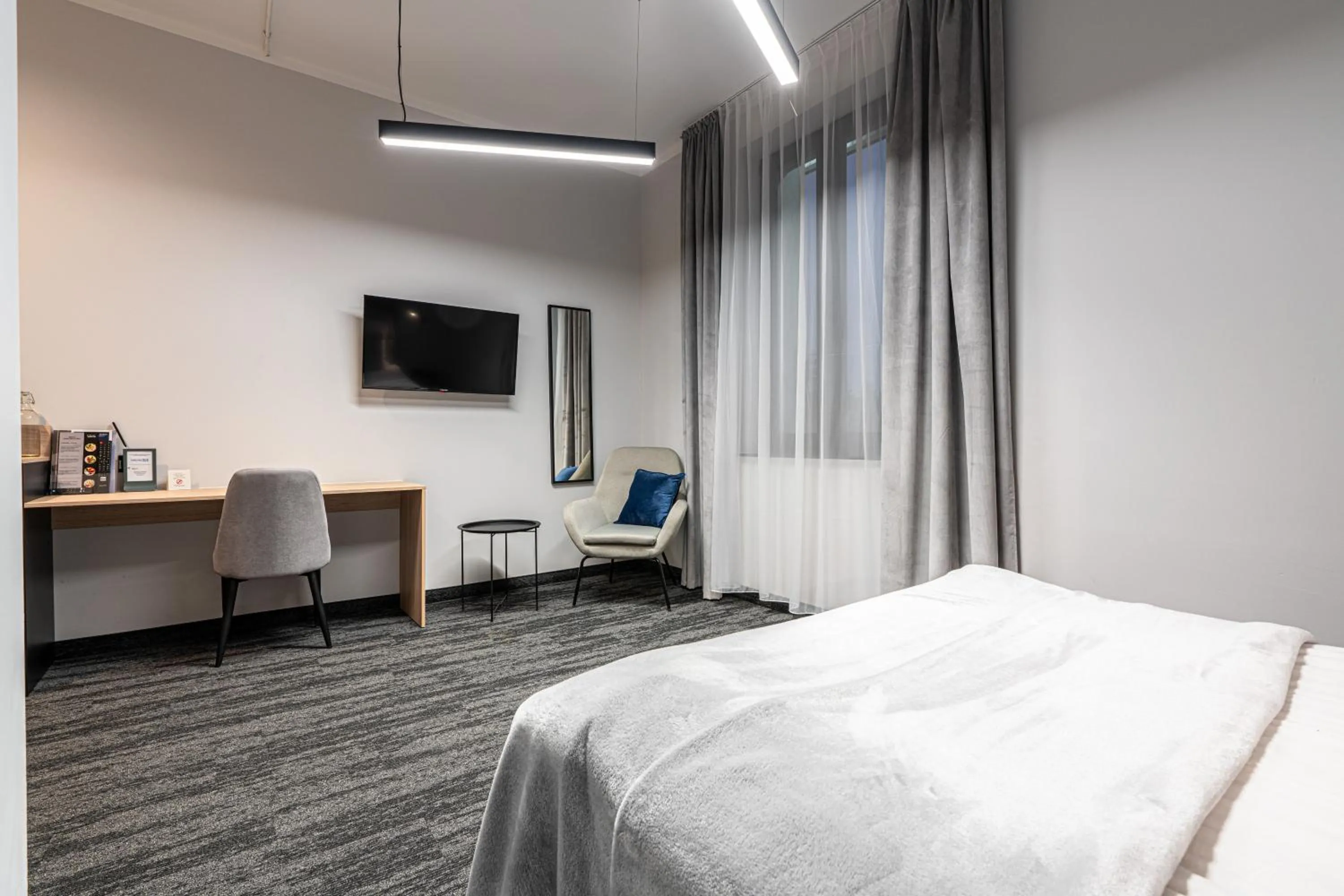 Photo of the whole room, Bed in VANTA Business Center