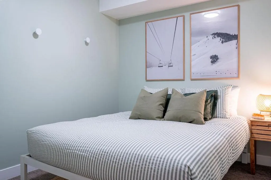 Bed in Powder Village Retreat by Revelstoke Vacations