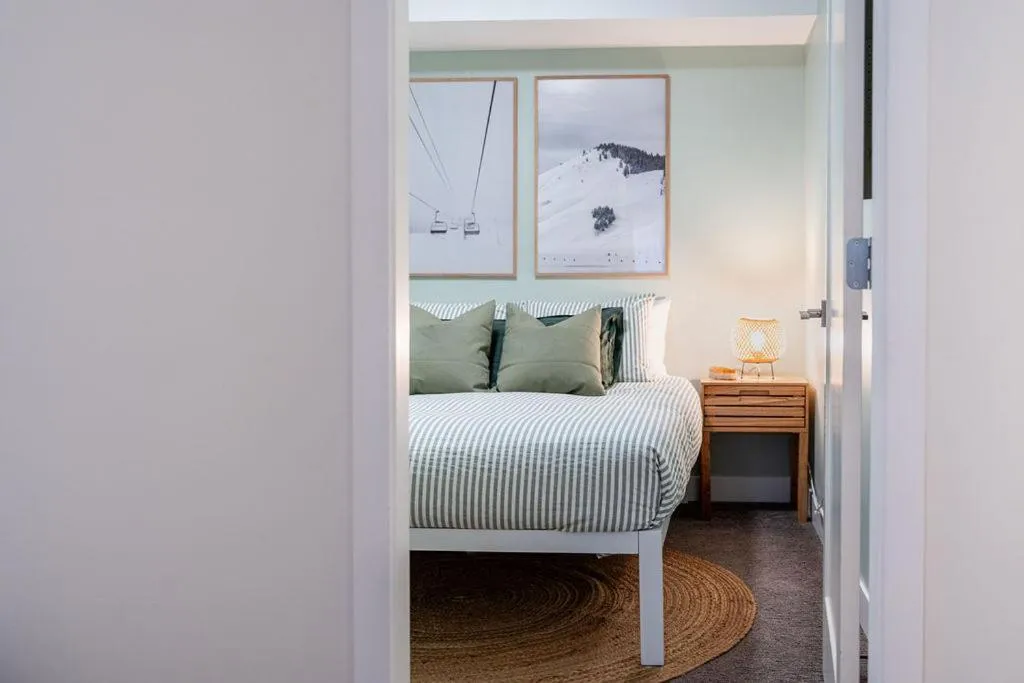 Bed in Powder Village Retreat by Revelstoke Vacations