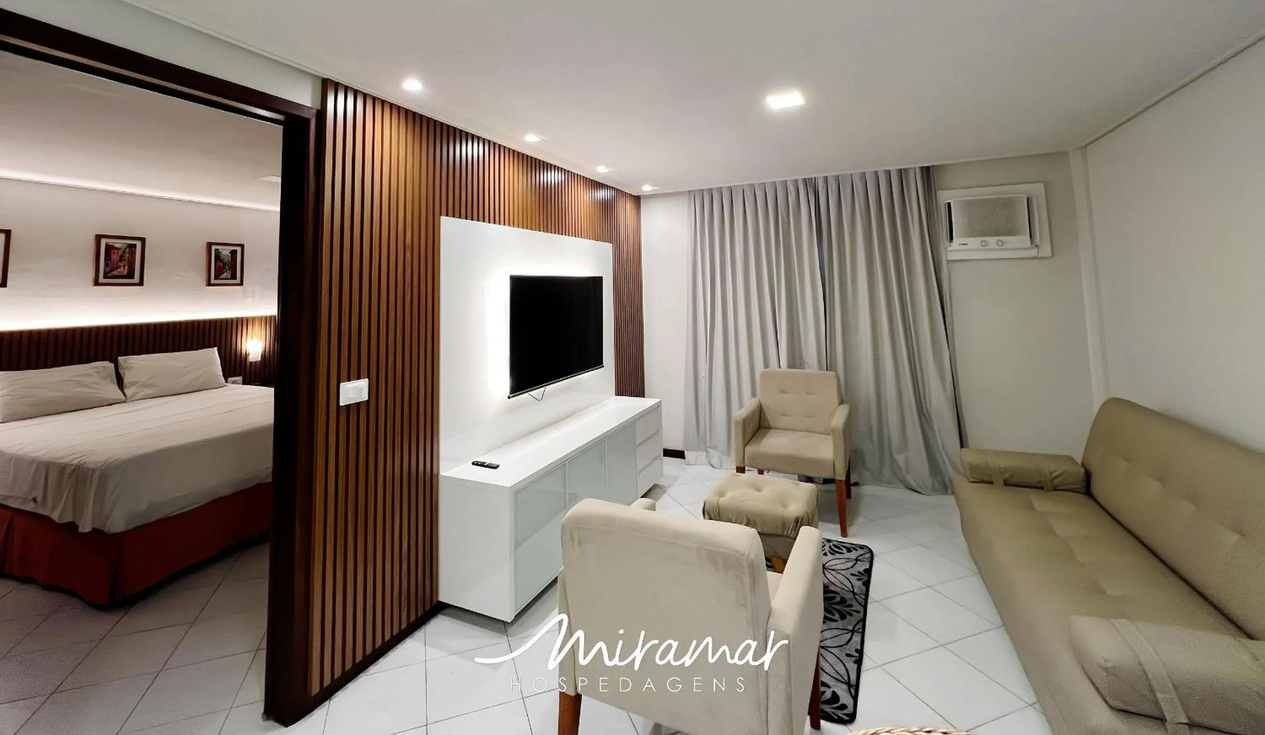 Living room, Bed in Ambassador Unidades Autônomas