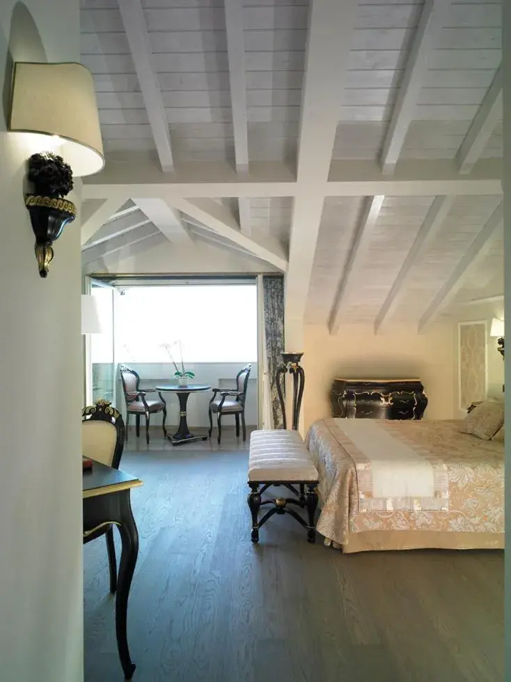 Seating area, Bed in Hotel Villa Del Sogno Seating area, Bed in Hotel Villa Del Sogno