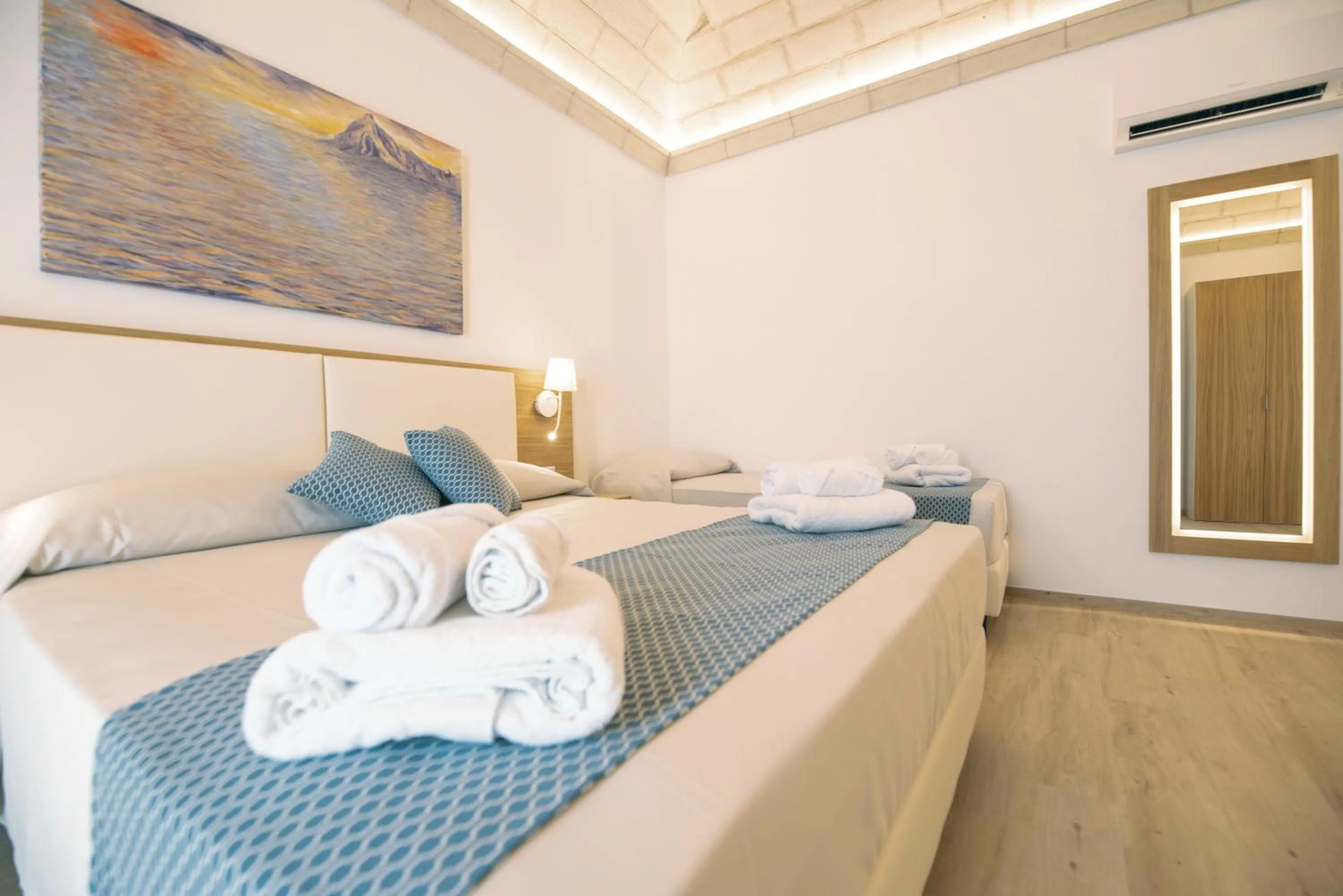 Bed in I MORI HOTEL