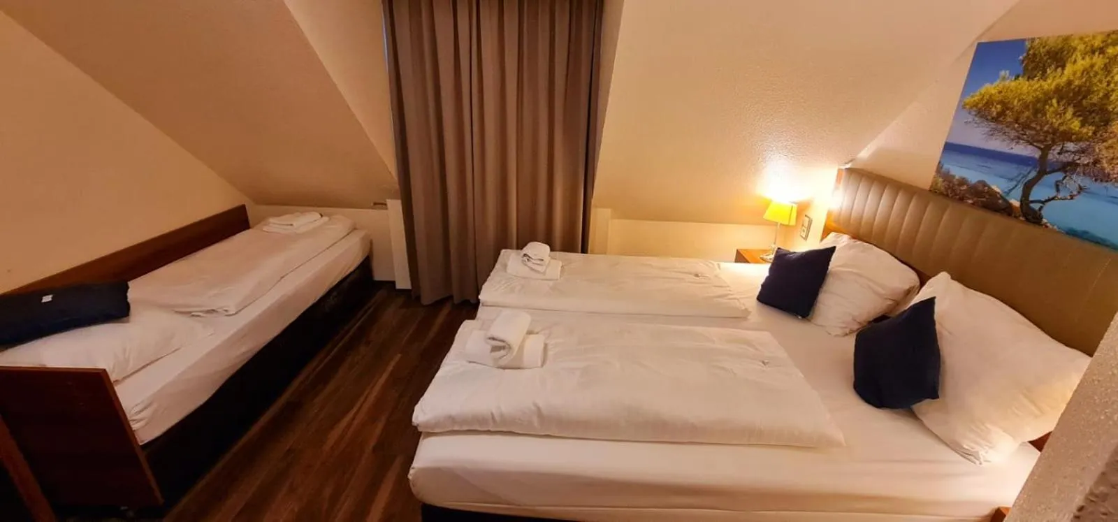 Photo of the whole room, Bed in Hotel Frankfurt Messe