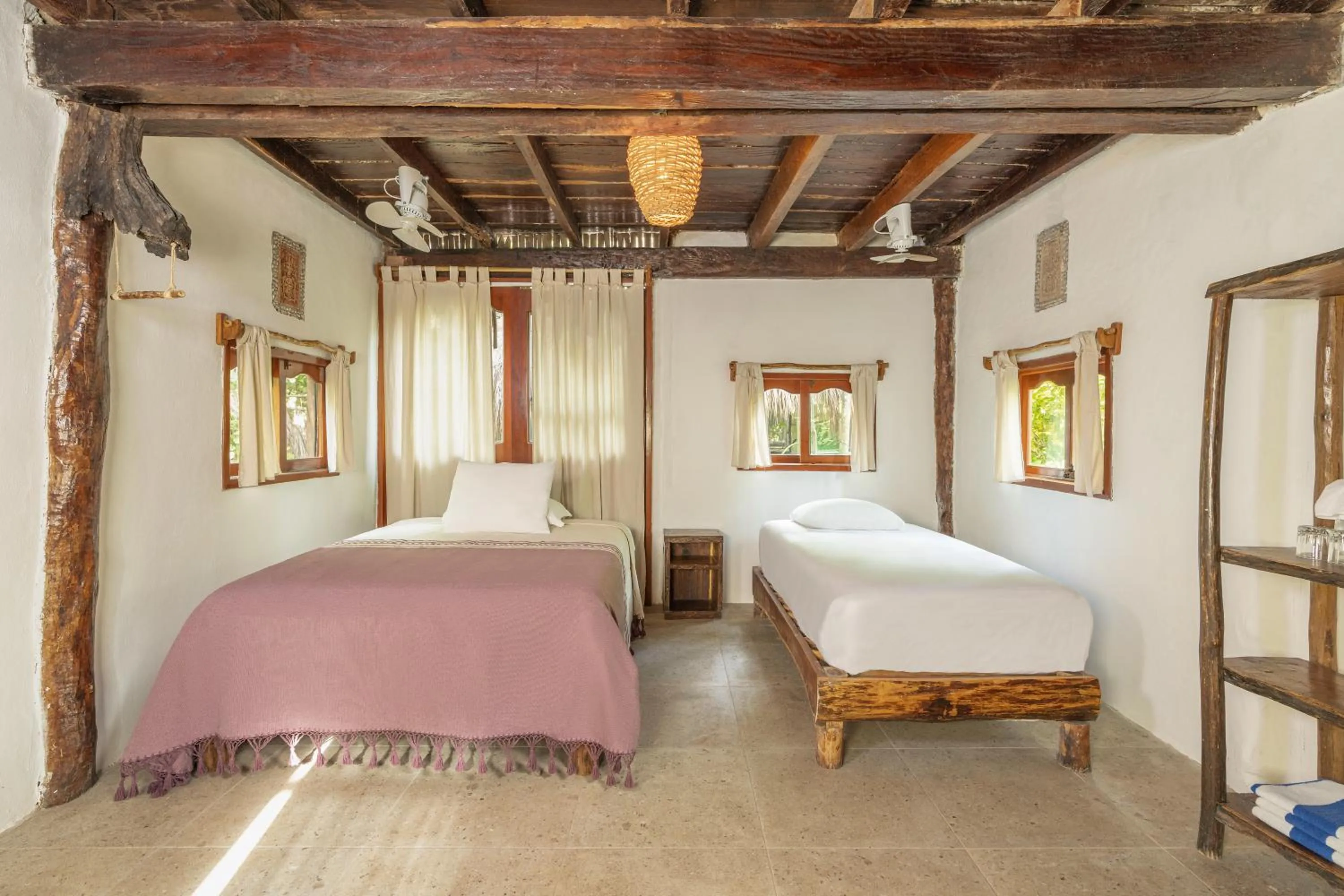 Bed in Yaxchen Tulum Cabañas & Cenote