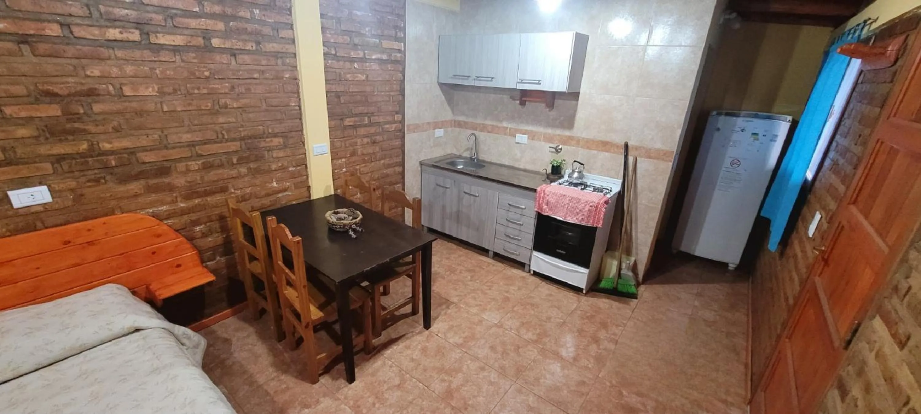 Kitchen or kitchenette in Cabañas Clarita