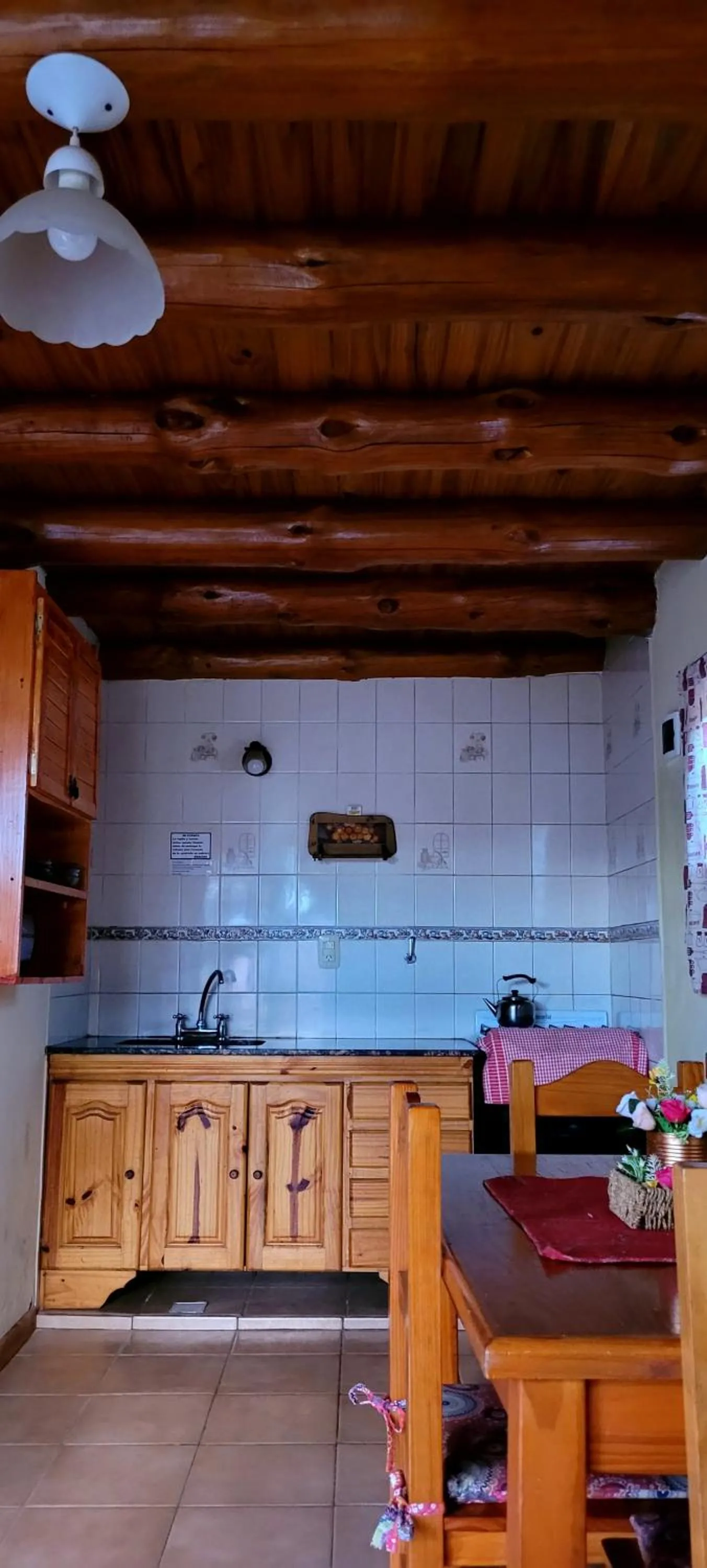 Kitchen or kitchenette in Cabañas Clarita