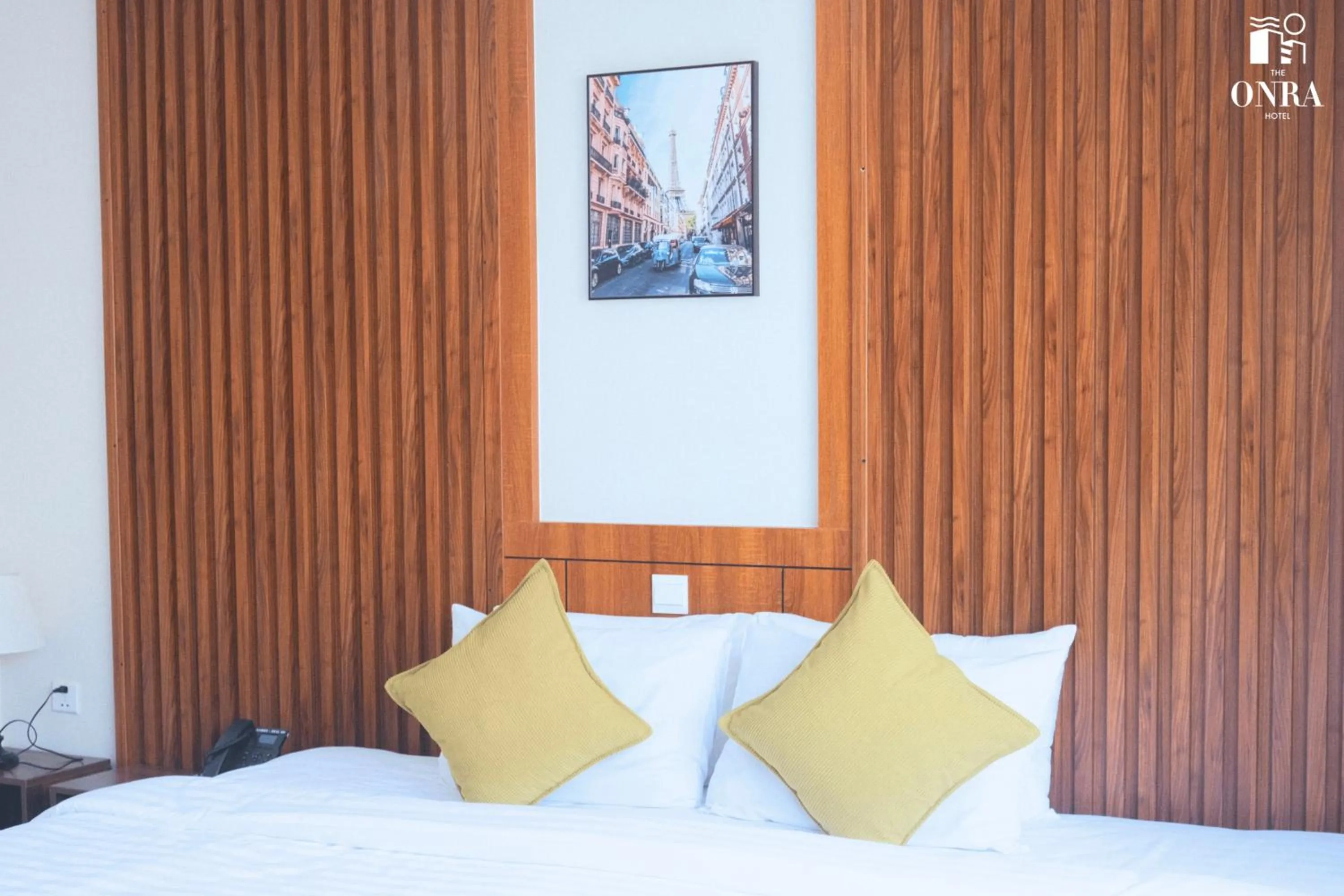 Bed in The ONRA Hotel