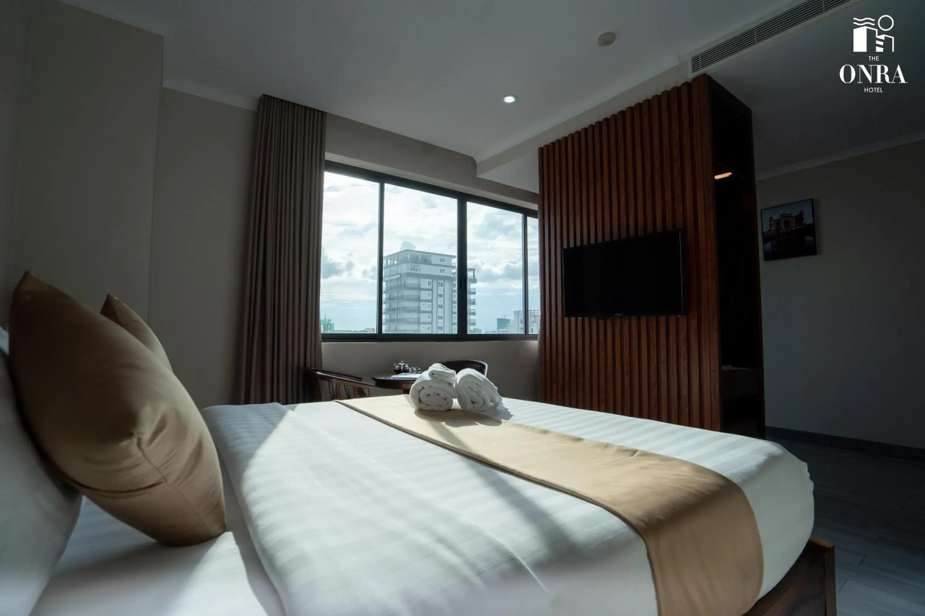 Communal lounge/ TV room, Bed in The ONRA Hotel Communal lounge/ TV room, Bed in The ONRA Hotel