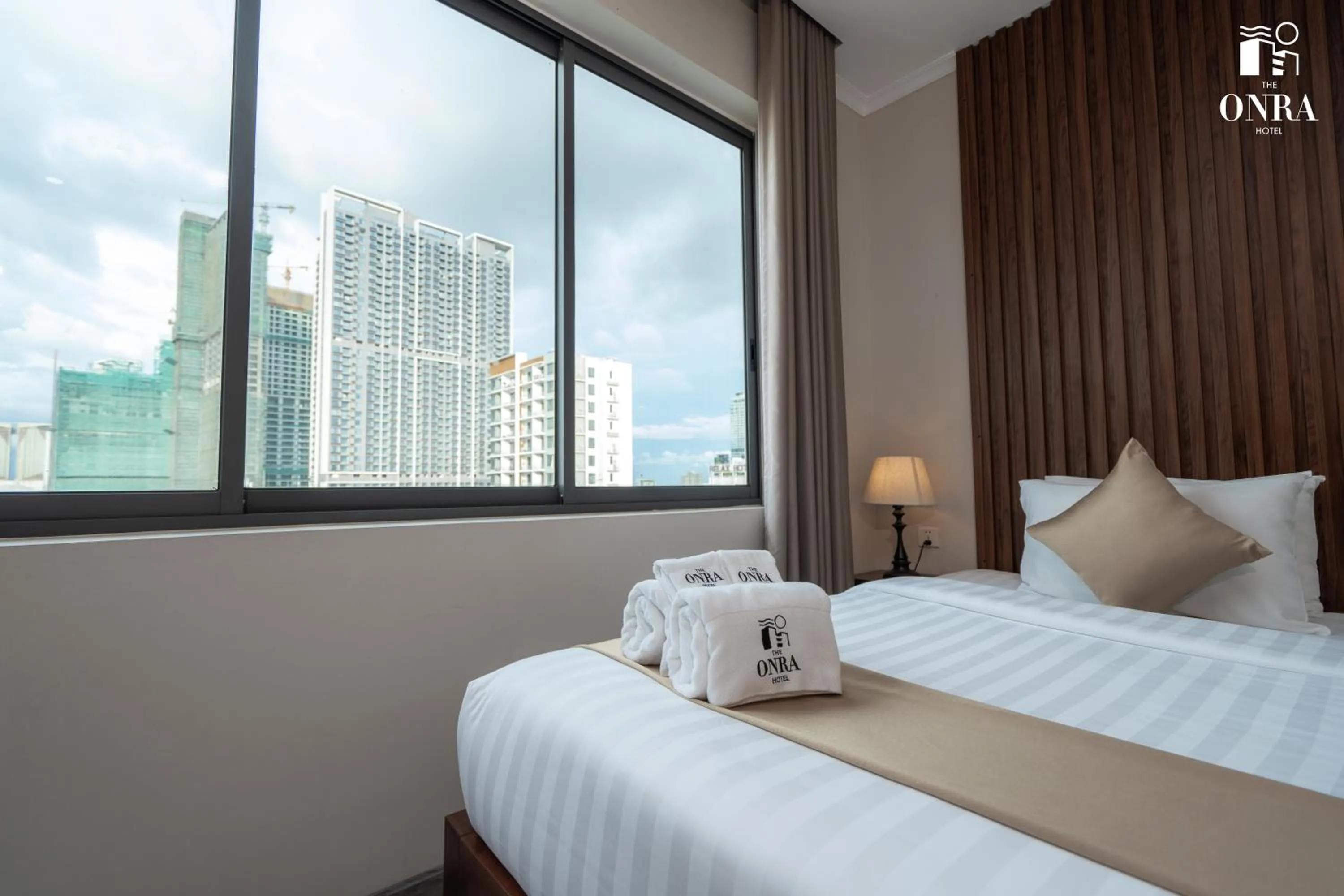 Bed in The ONRA Hotel