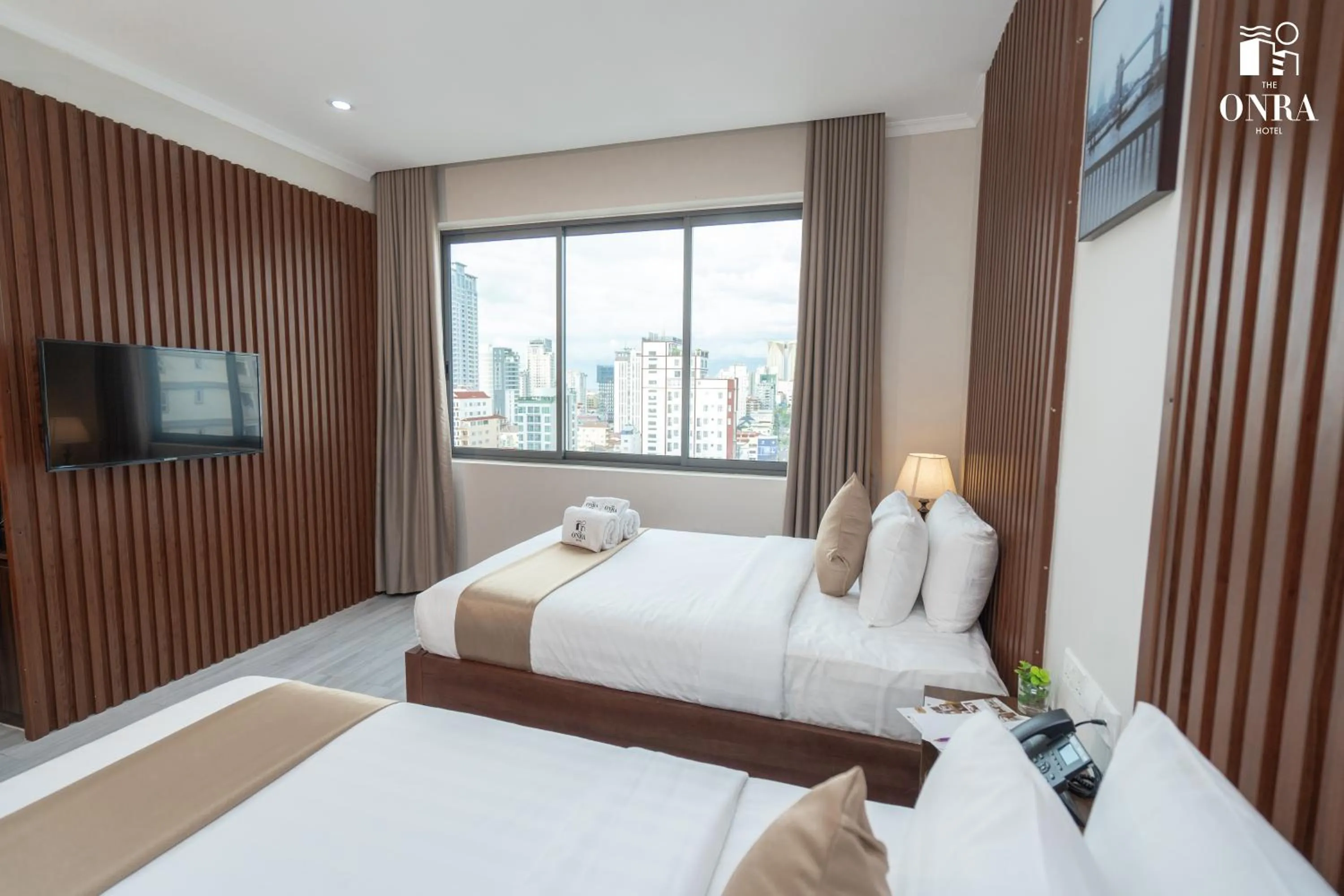 Bed in The ONRA Hotel