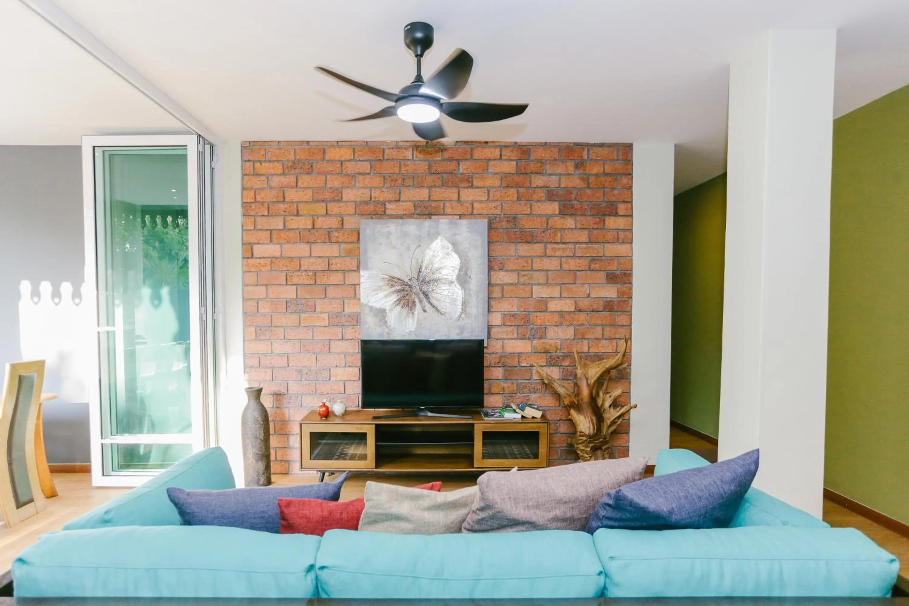 Communal lounge/ TV room in Royale Riviera Resort Private Pool Villas