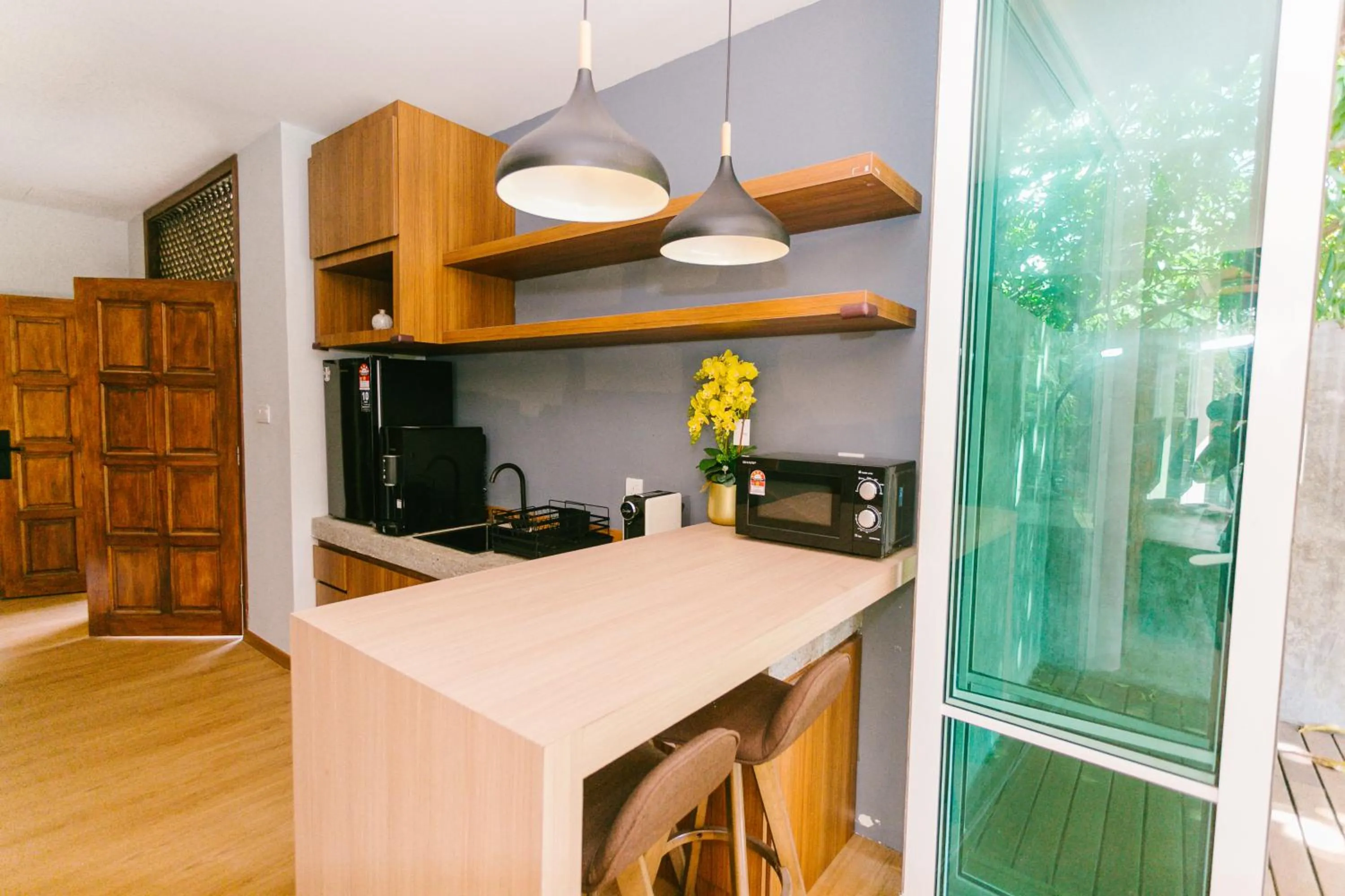 Kitchen or kitchenette in Royale Riviera Resort Private Pool Villas