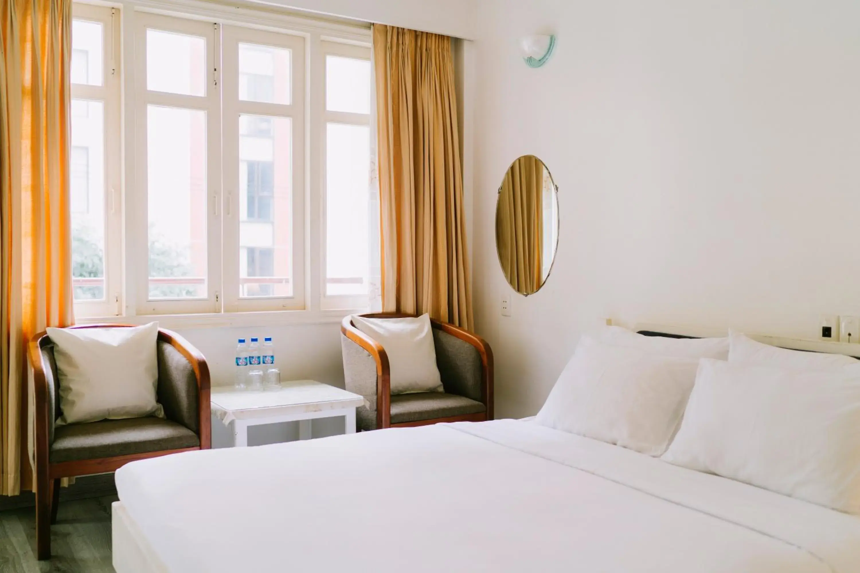 Seating area, Bed in Mercury Hotel & Apartment Seating area, Bed in Mercury Hotel & Apartment