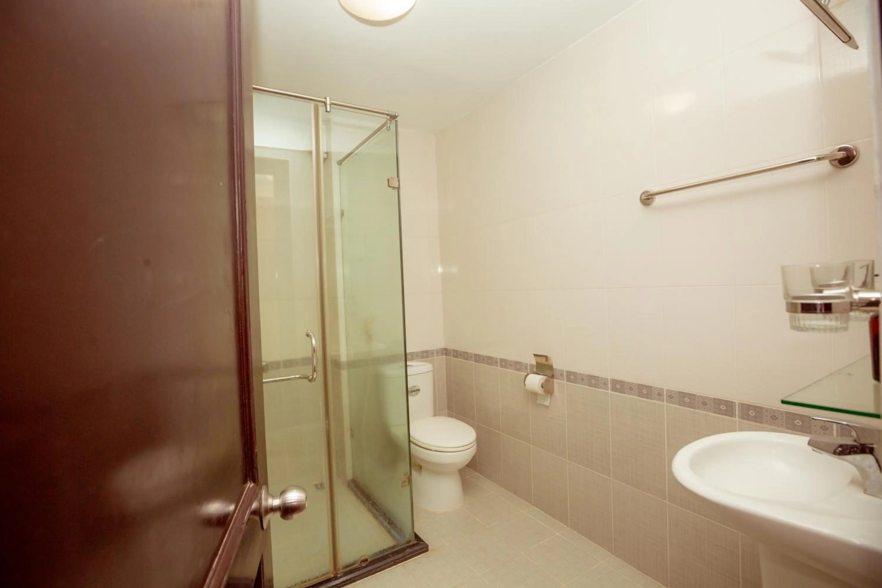 Toilet in Mercury Hotel & Apartment