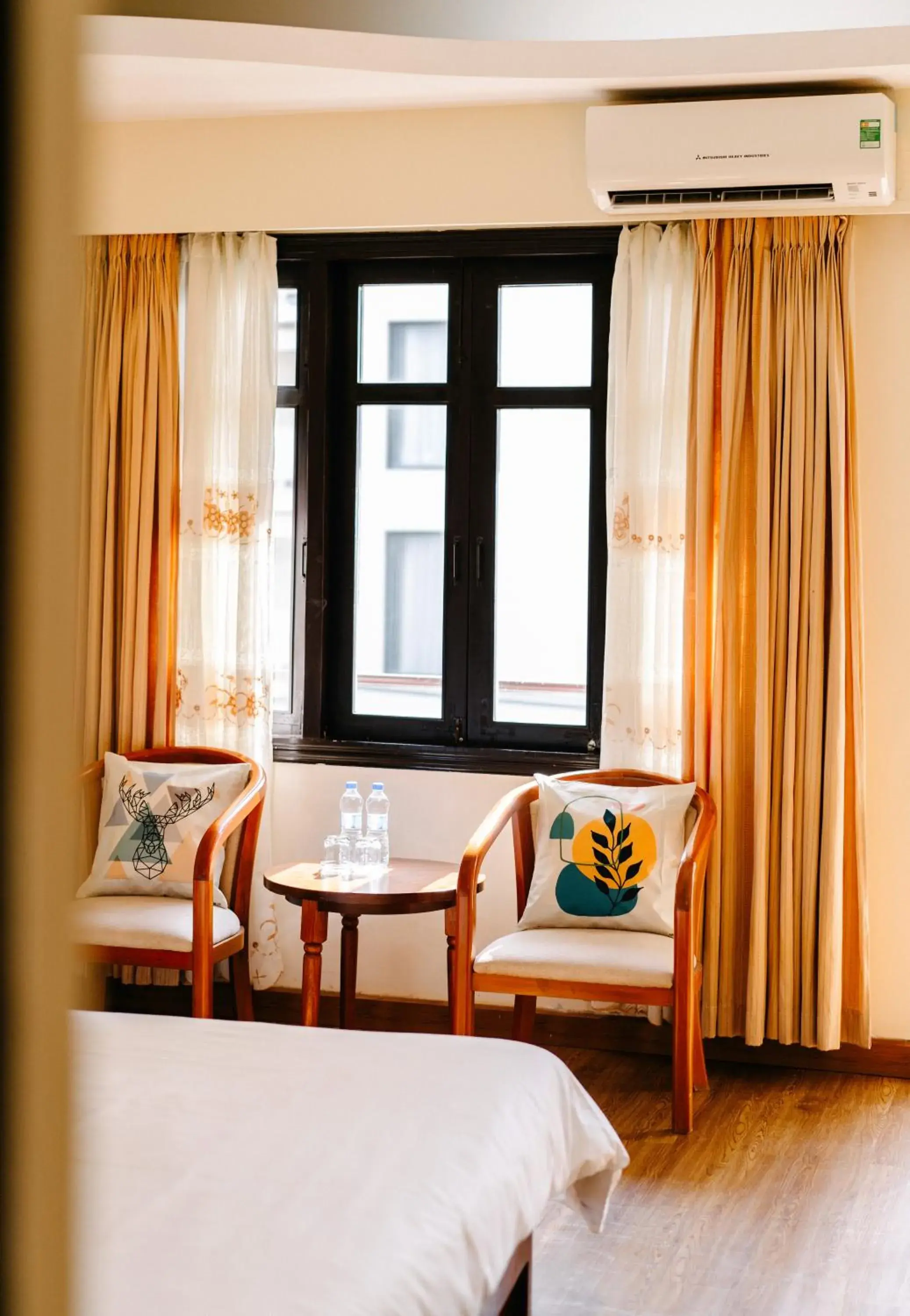 Seating area, Bed in Mercury Hotel & Apartment Seating area, Bed in Mercury Hotel & Apartment