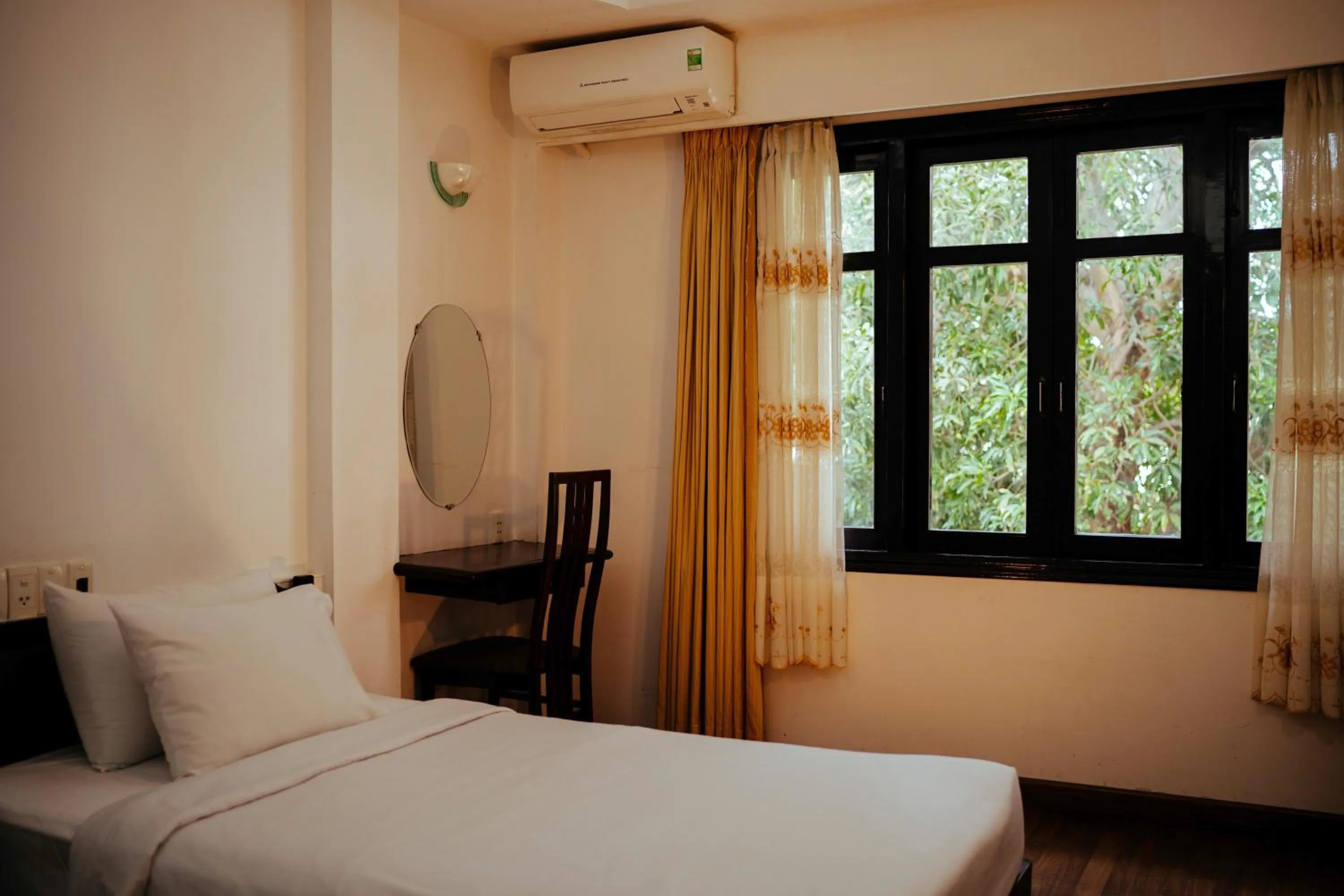 Bed in Mercury Hotel & Apartment