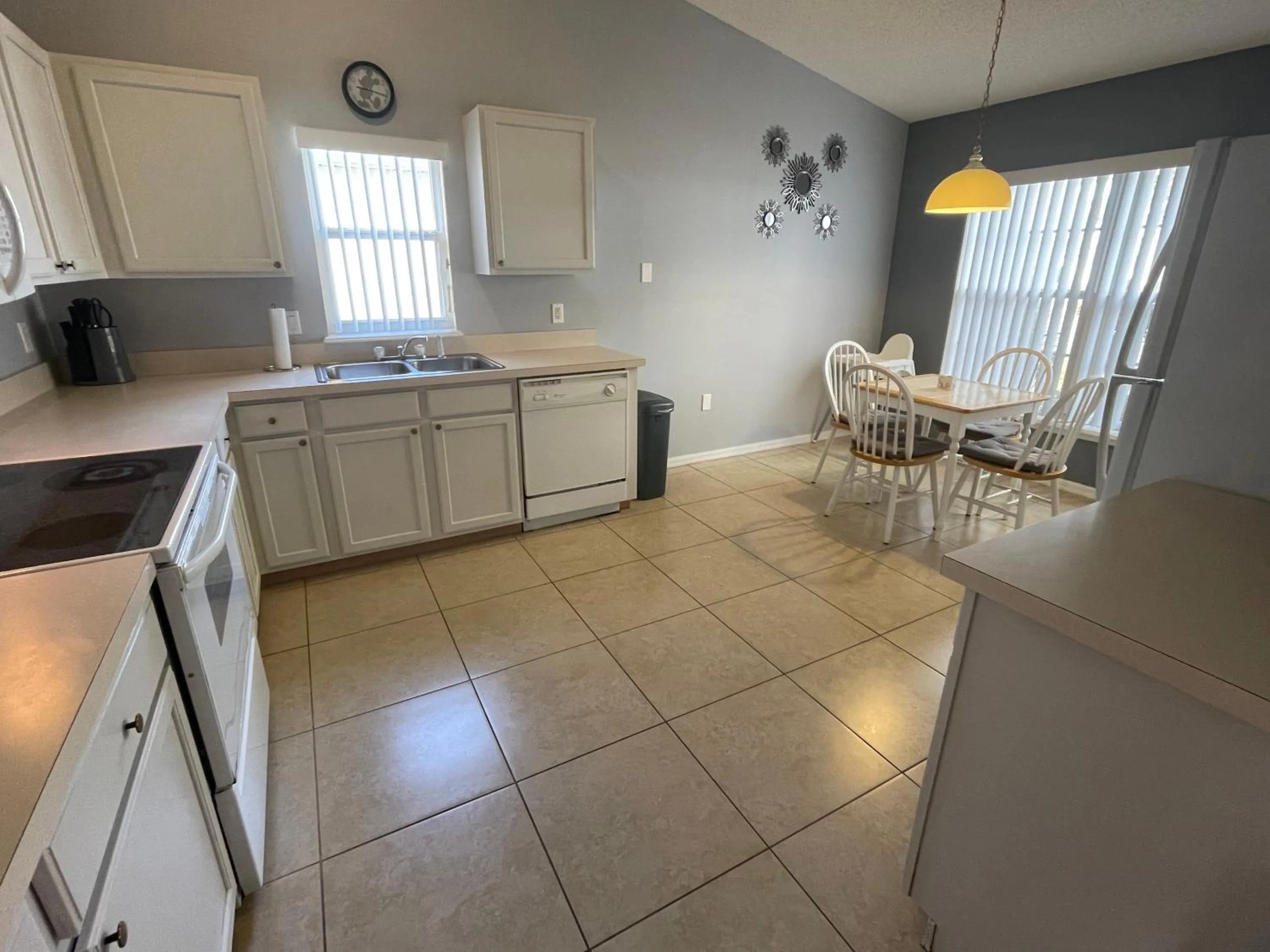 Kitchen or kitchenette in 3 Bedroom Villa with Poolside Cinema and Games Room Close to theme Parks sleeps 6 plus 2