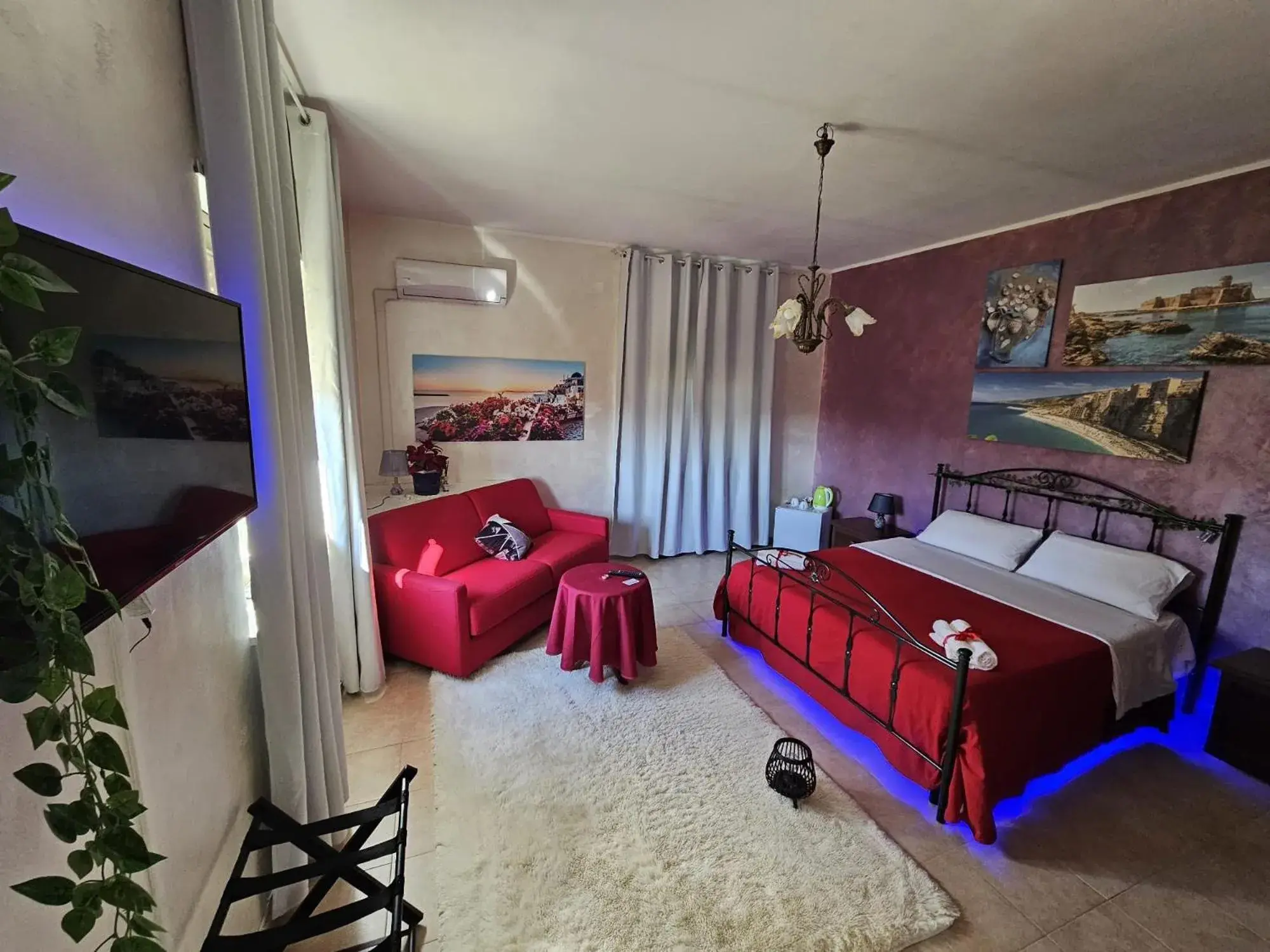 Deluxe Double Room with Extra Bed in B&B Villa Maracujà Deluxe Double Room with Extra Bed in B&B Villa Maracujà