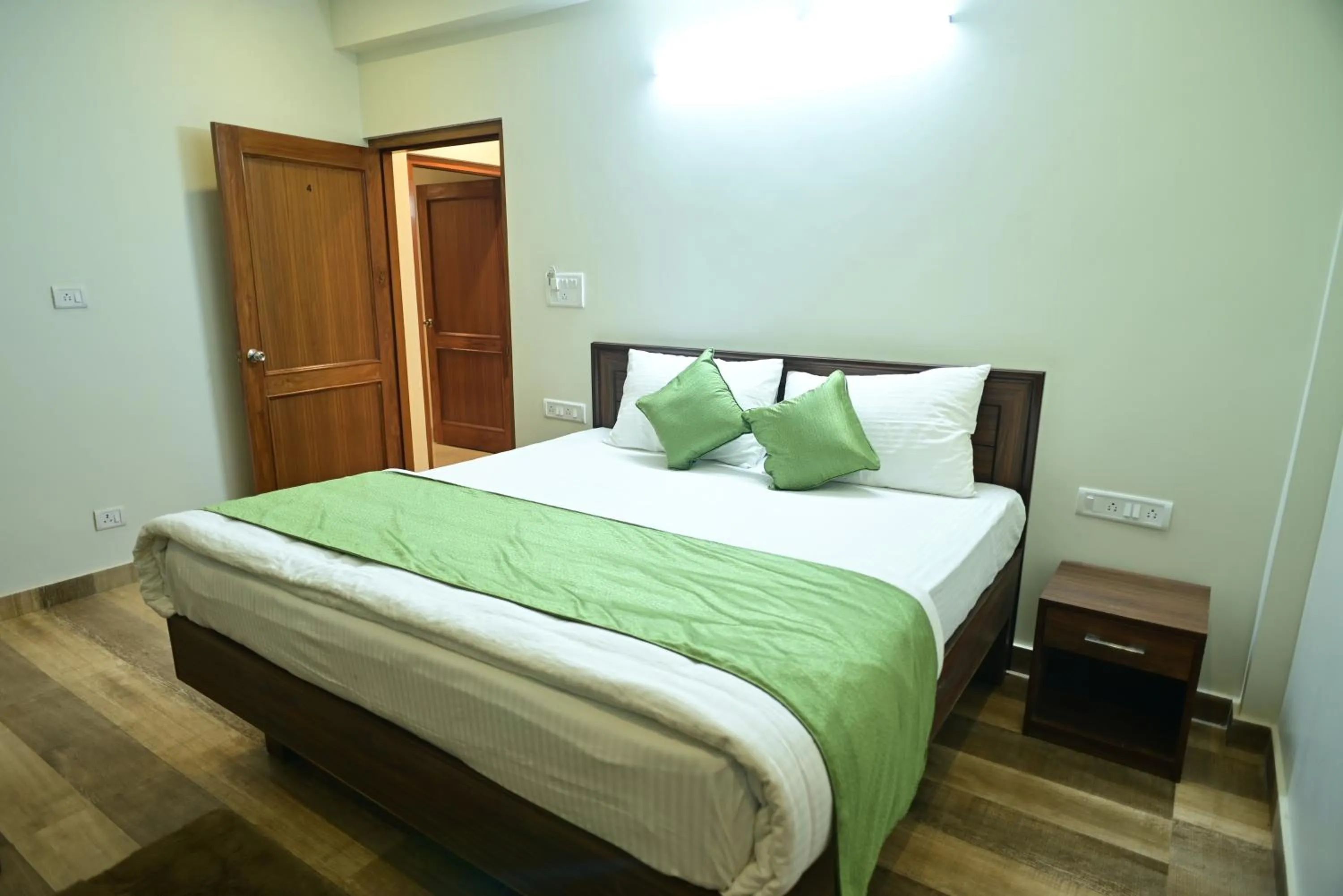 Bed in The Fern Villas Nainital By Beyond Stay