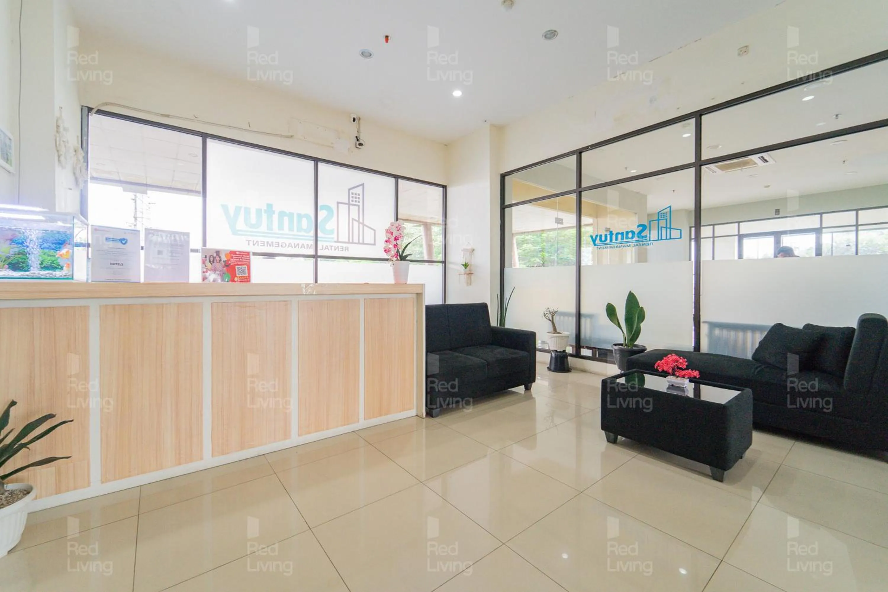Living room in RedLiving Apartemen Tamansari Panoramic - Santuy Agency