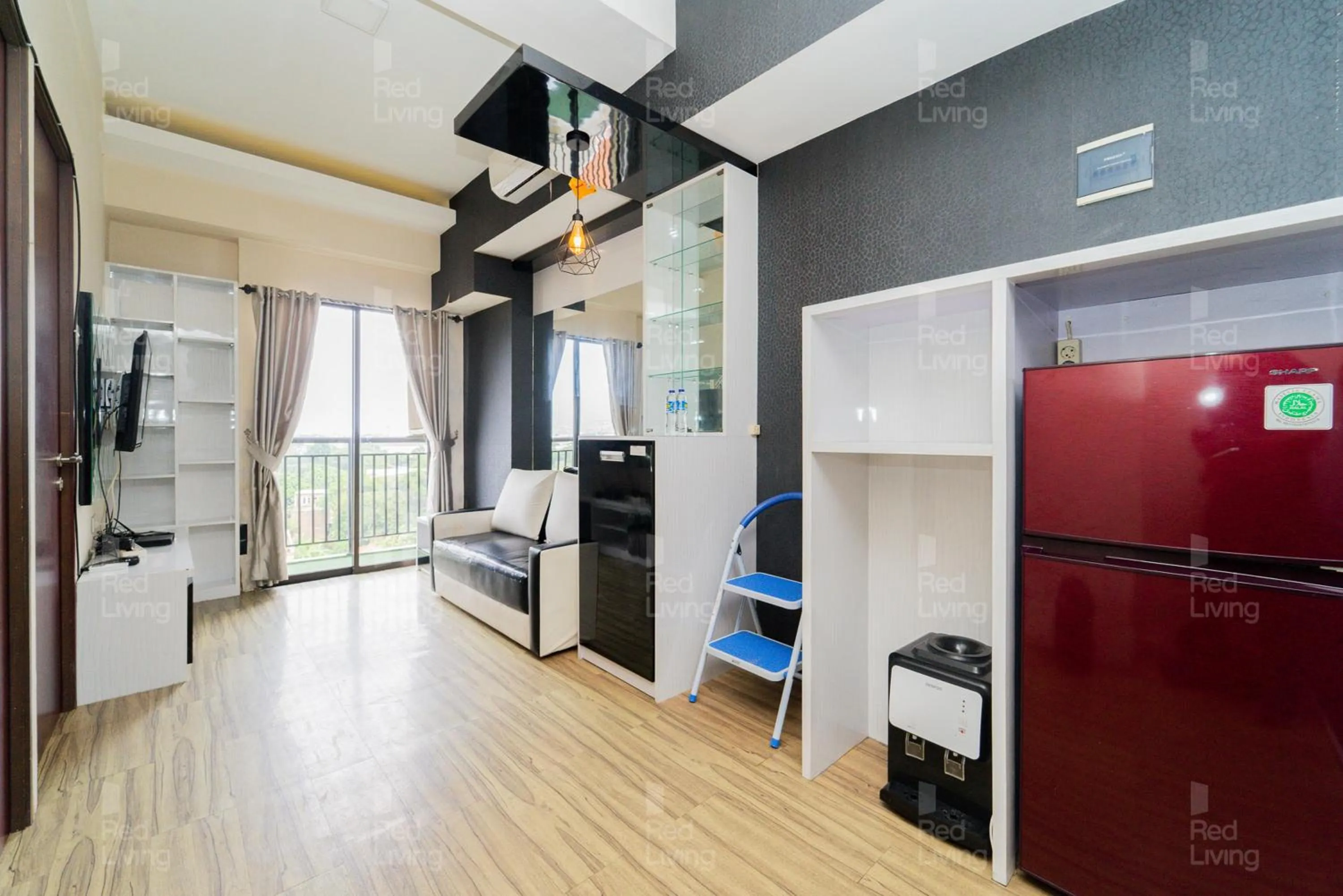 TV and multimedia in RedLiving Apartemen Tamansari Panoramic - Santuy Agency