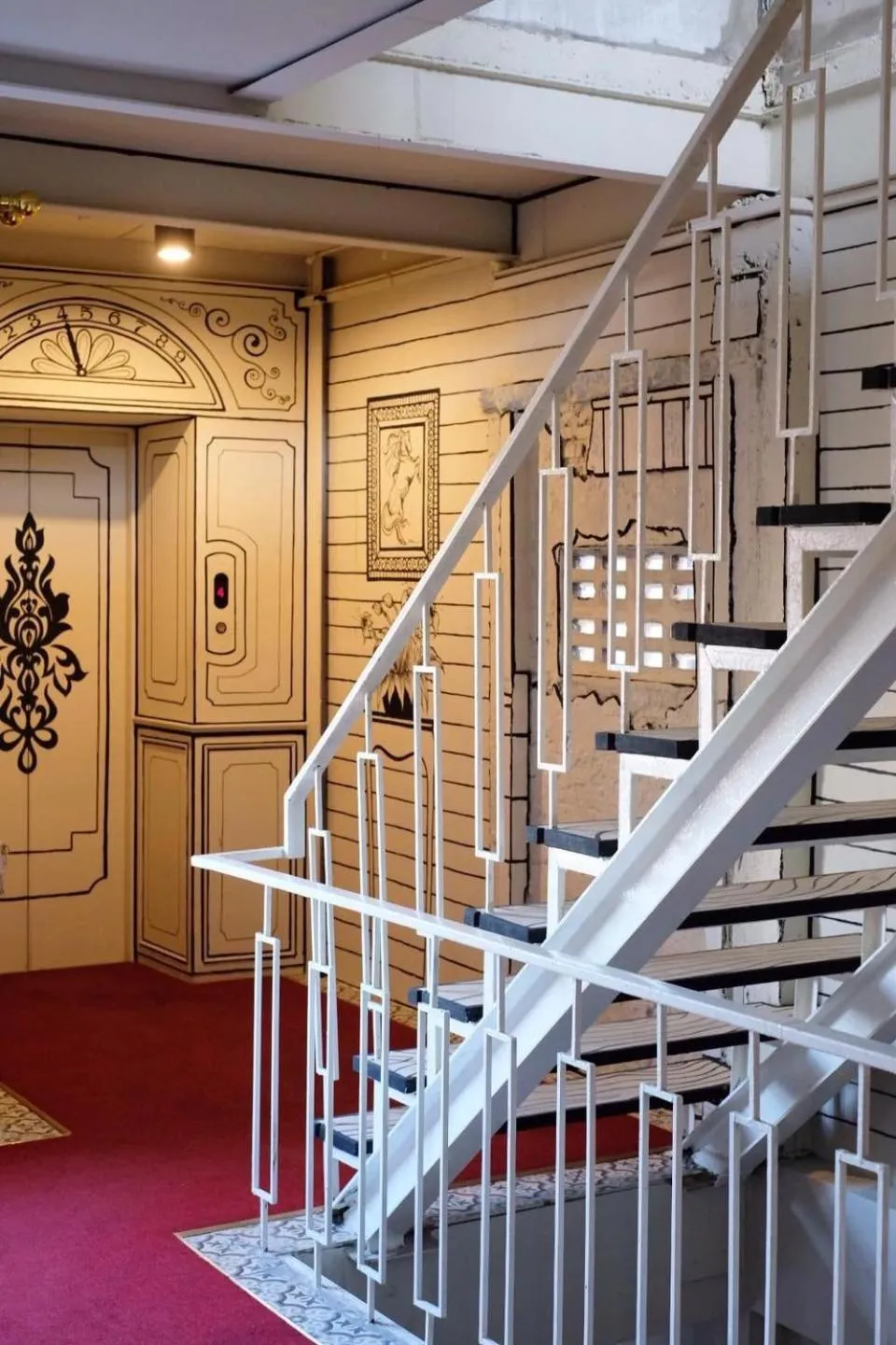 elevator in 2499 Heritage Chinatown Bangkok Hotel By RoomQuest