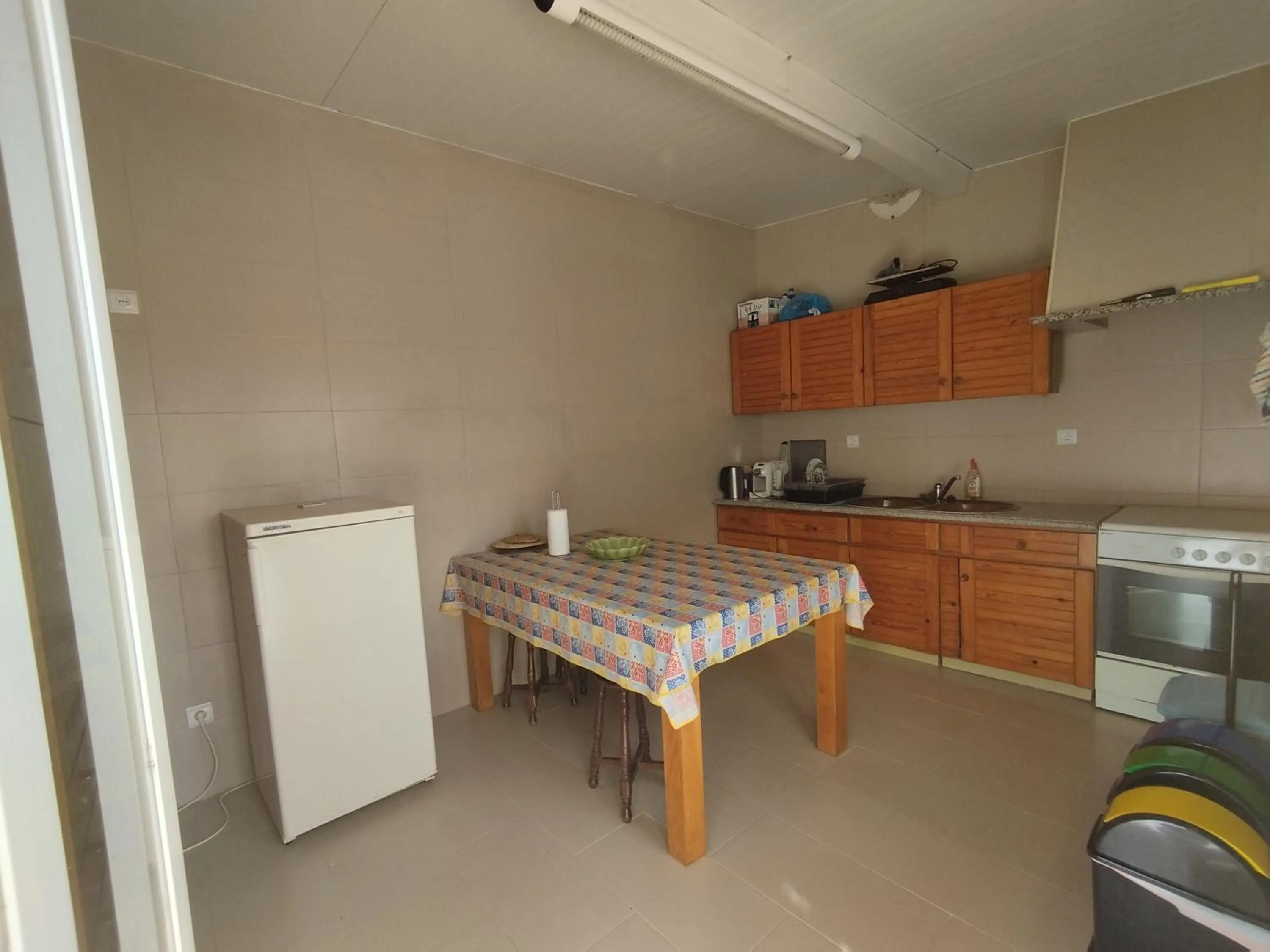 Communal kitchen in Brisa Do Mar - Consolação