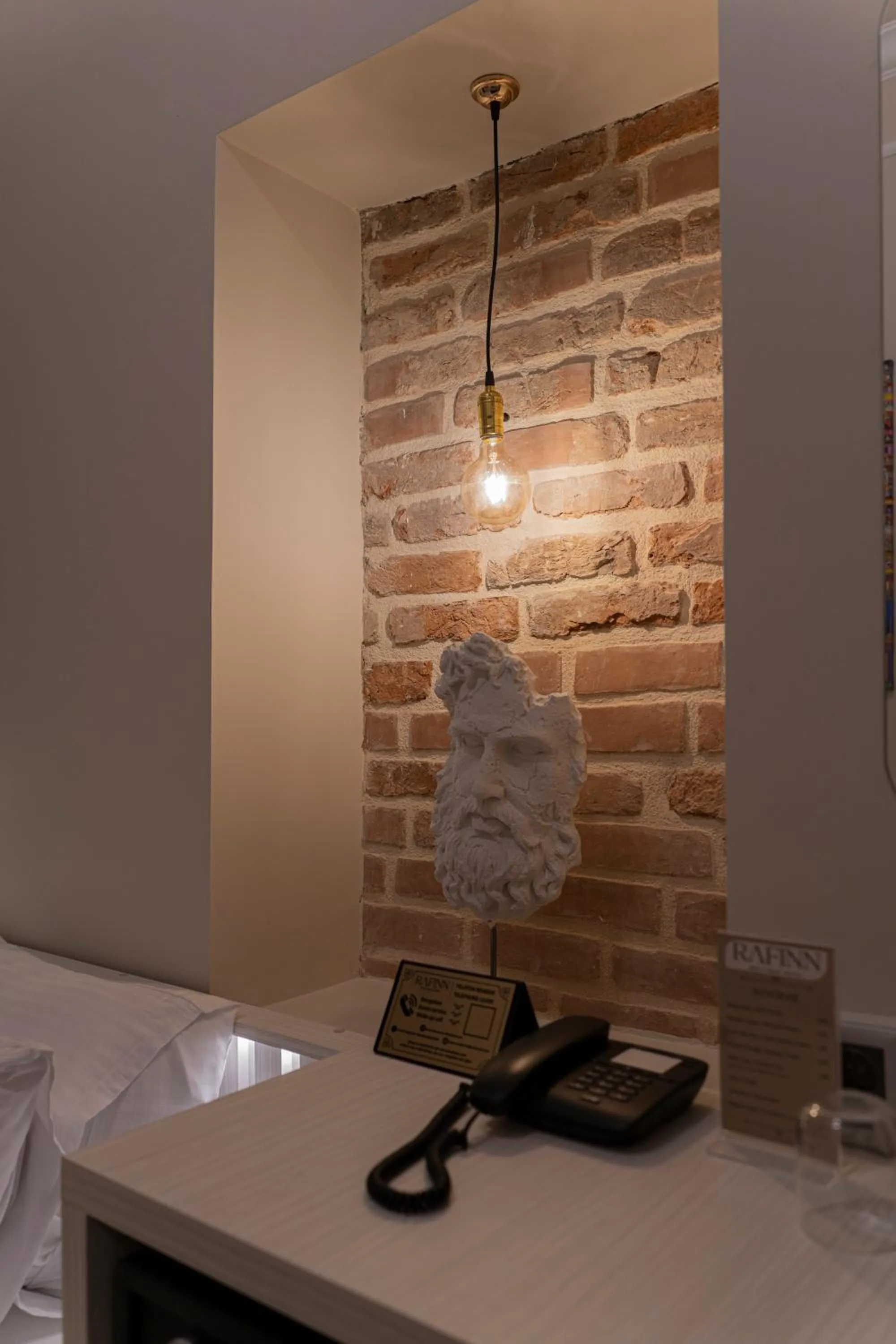 Decorative detail, Bed in Rafinn Hotel