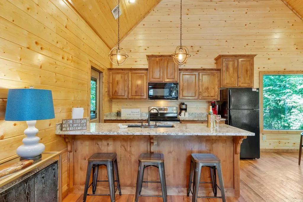 Gorgeous Idyllic Cabin w Hot Tub and Fire Pit Quittin Time is Secluded Romantic Oasis w Luxury Bathroom Double Shower and Bathtub Foosball Table