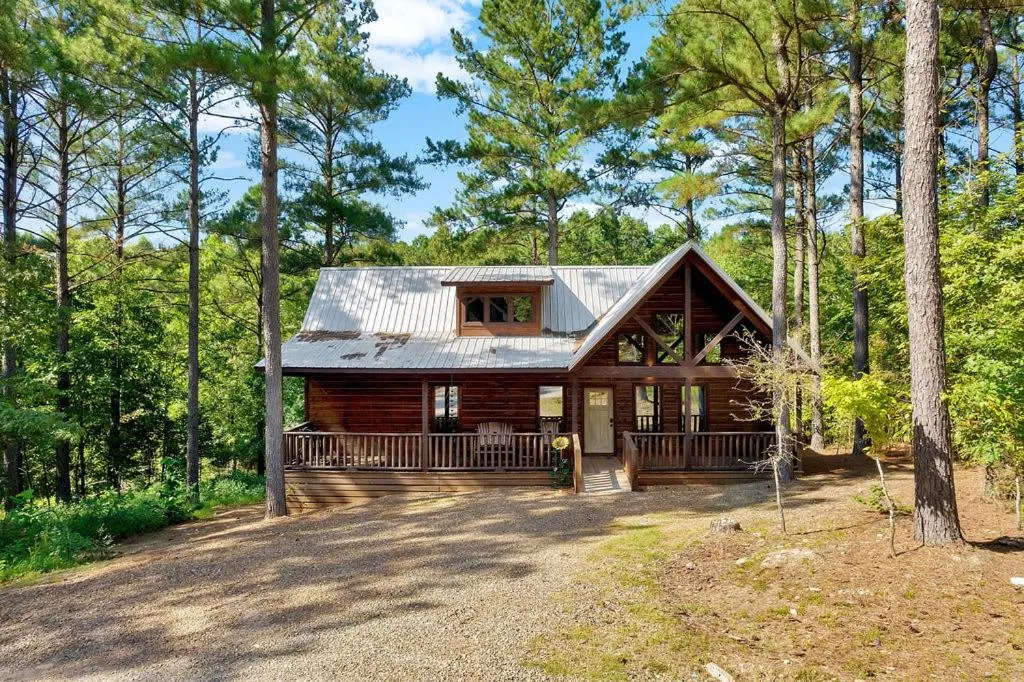 Gorgeous Idyllic Cabin w Hot Tub and Fire Pit Quittin Time is Secluded Romantic Oasis w Luxury Bathroom Double Shower and Bathtub Foosball Table