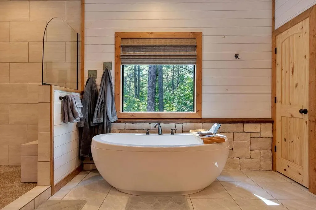 Gorgeous Idyllic Cabin w Hot Tub and Fire Pit Quittin Time is Secluded Romantic Oasis w Luxury Bathroom Double Shower and Bathtub Foosball Table