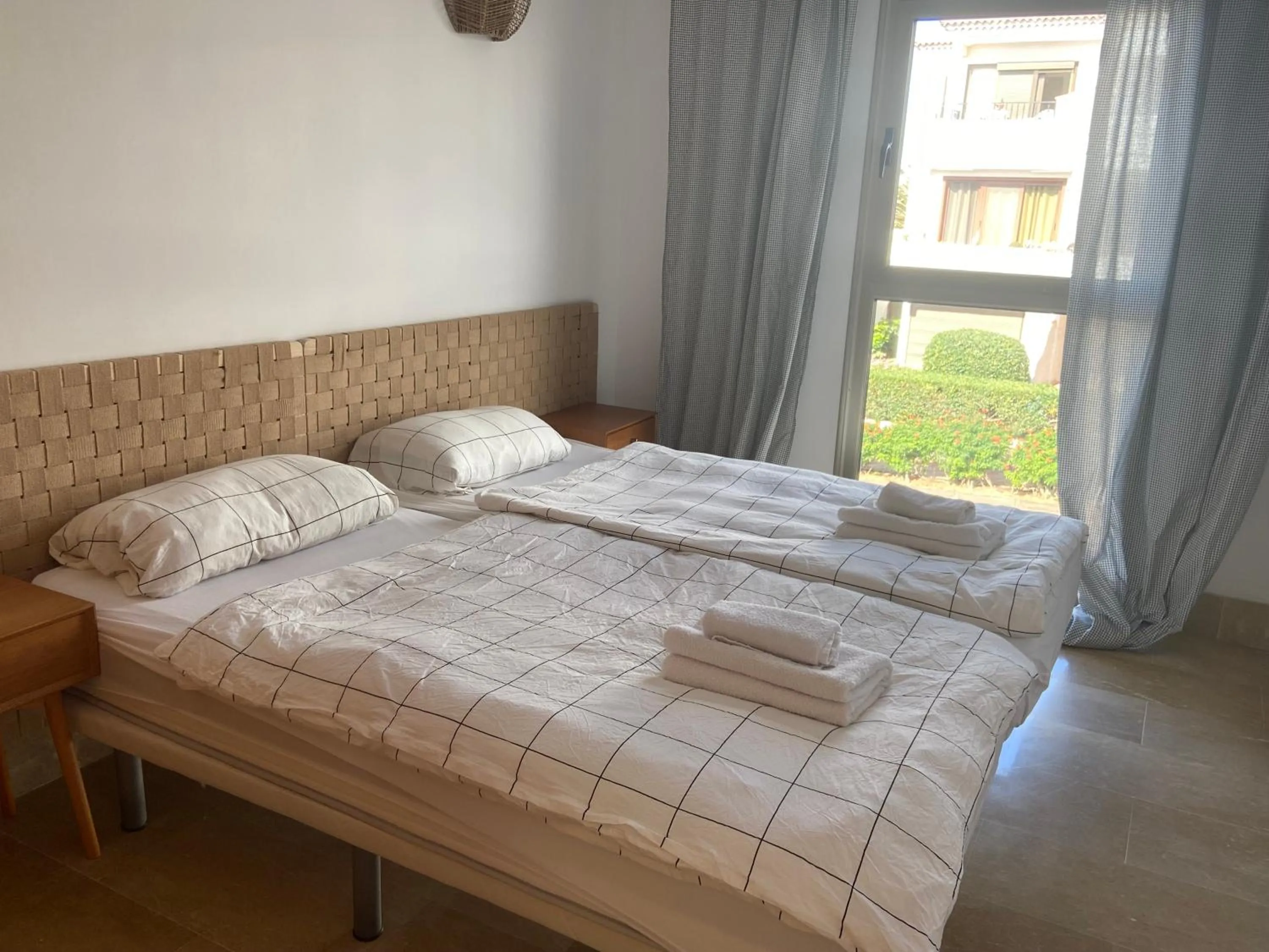 Bed in SUN BAY VILLAS APARTMENT