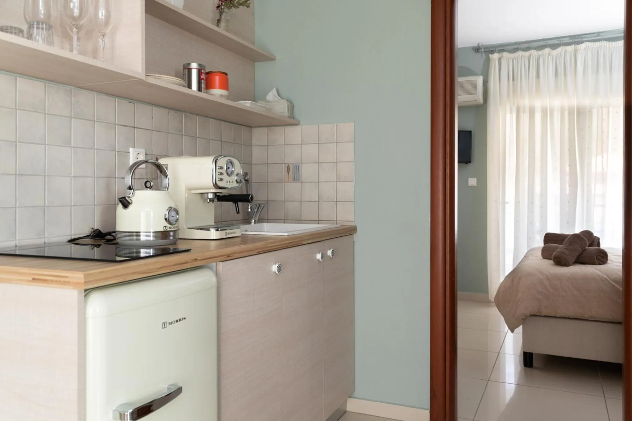 Kitchen or kitchenette in Arsas Suites