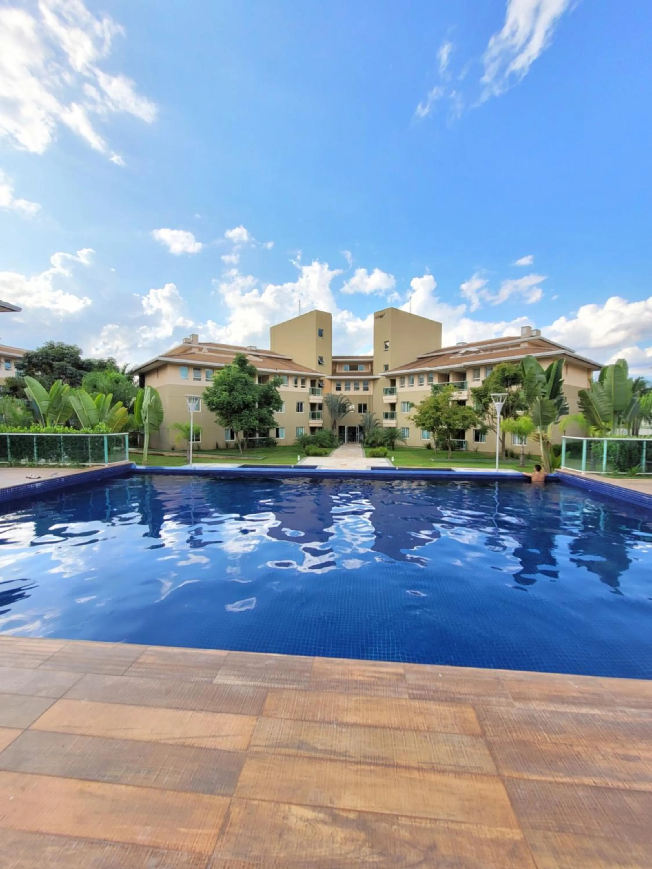 Swimming pool in The Sun Resort By Rei dos Flats