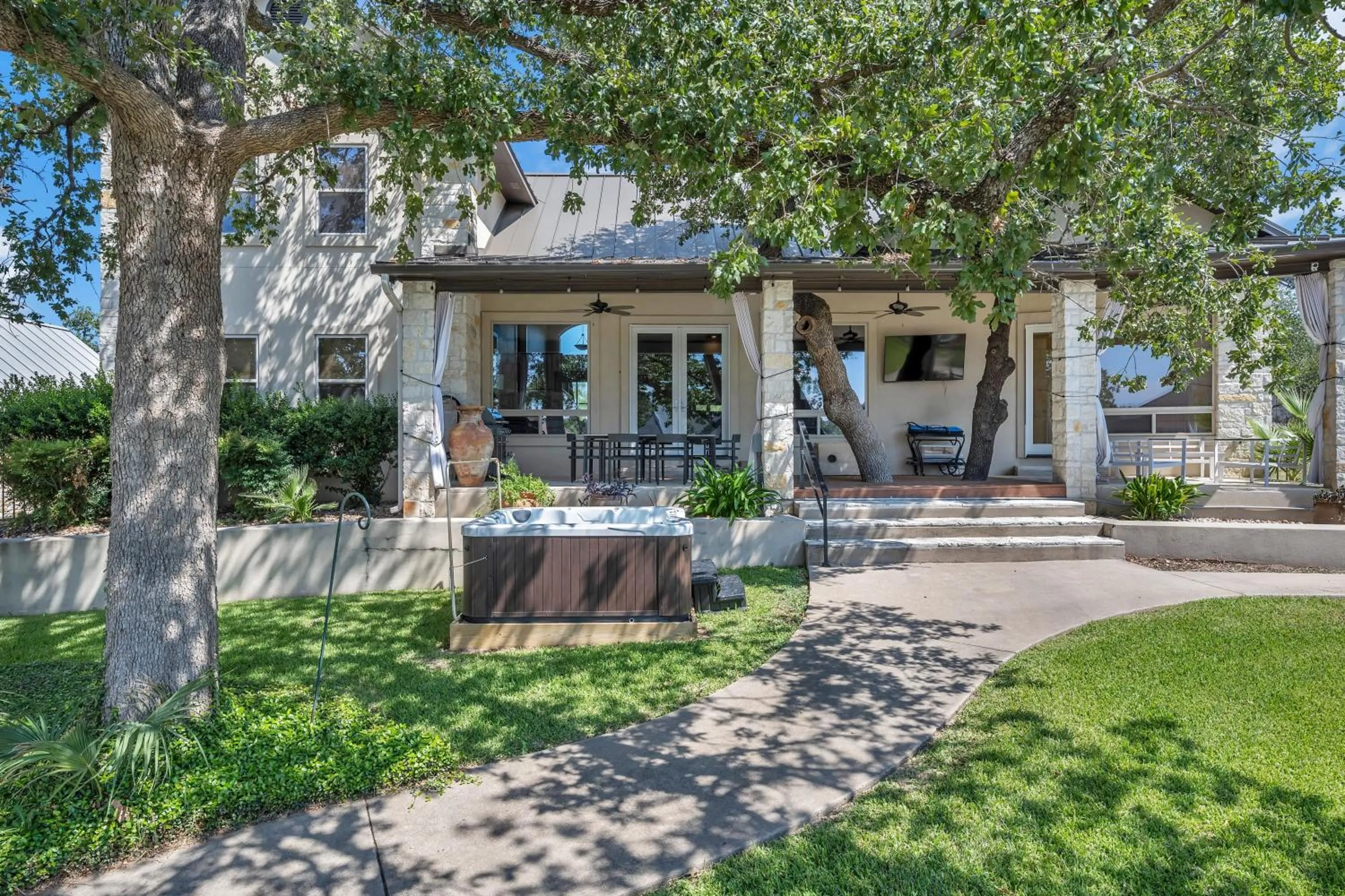Waterfront Home with Boat Slip, Spacious Outdoor Patio and a Fenced Yard