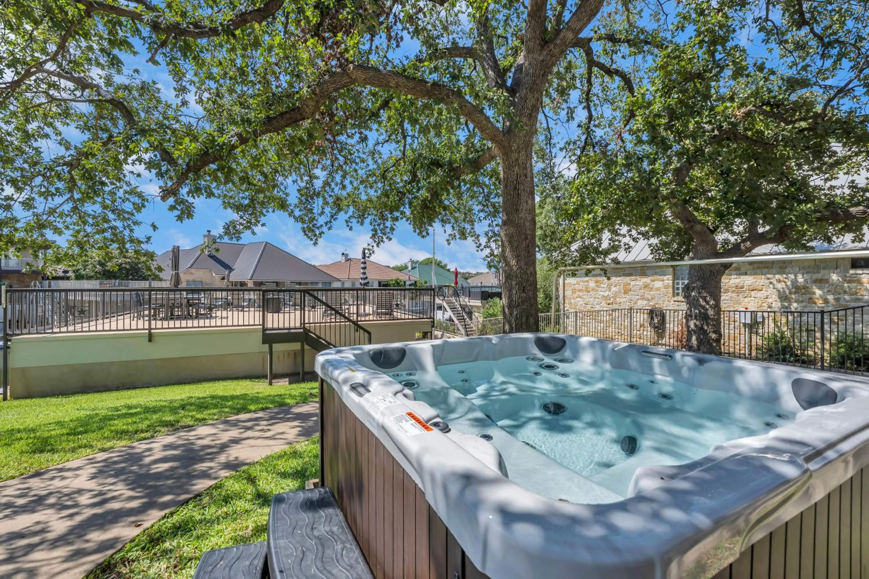 Waterfront Home with Boat Slip, Spacious Outdoor Patio and a Fenced Yard