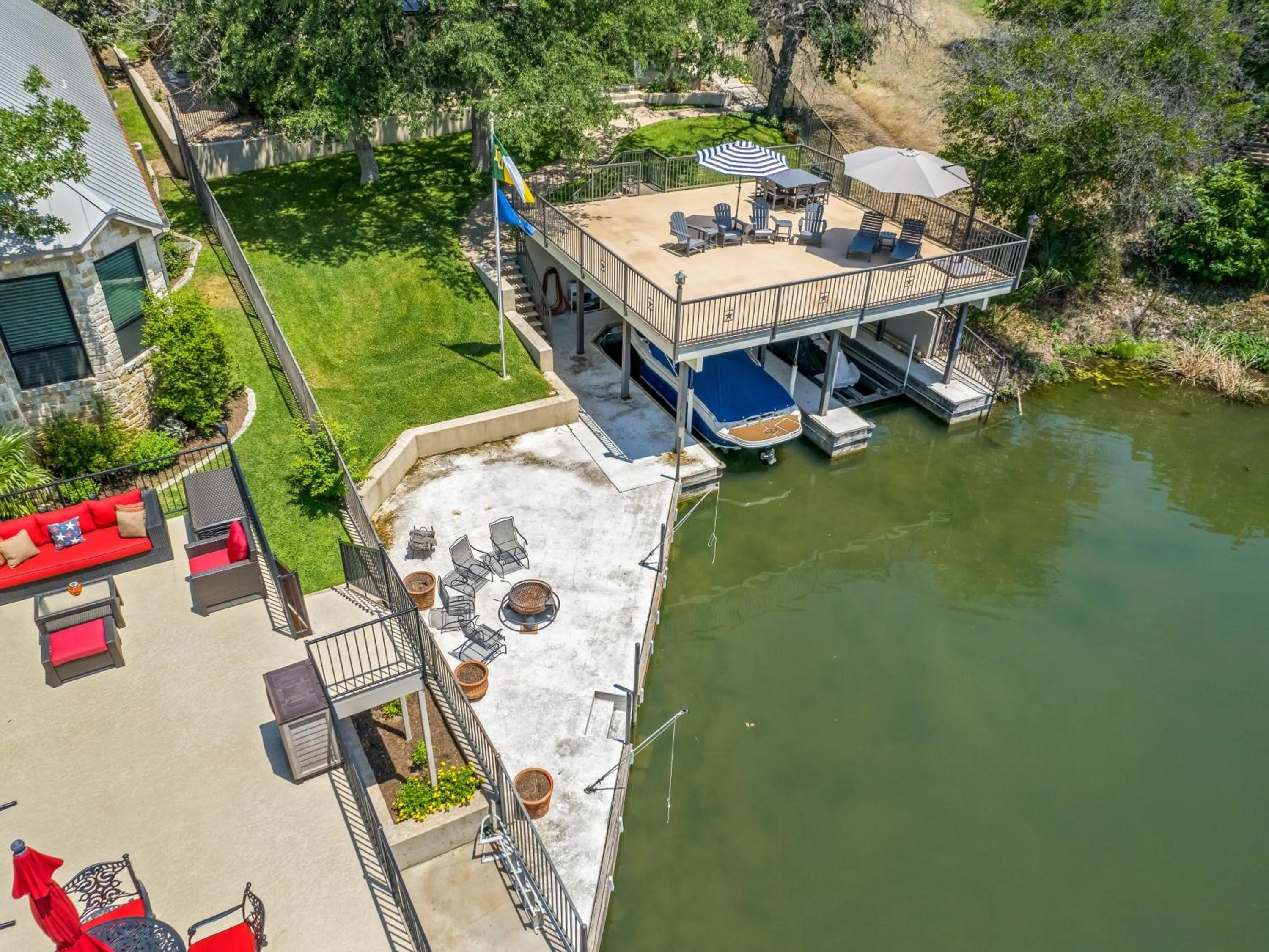 Waterfront Home with Boat Slip, Spacious Outdoor Patio and a Fenced Yard