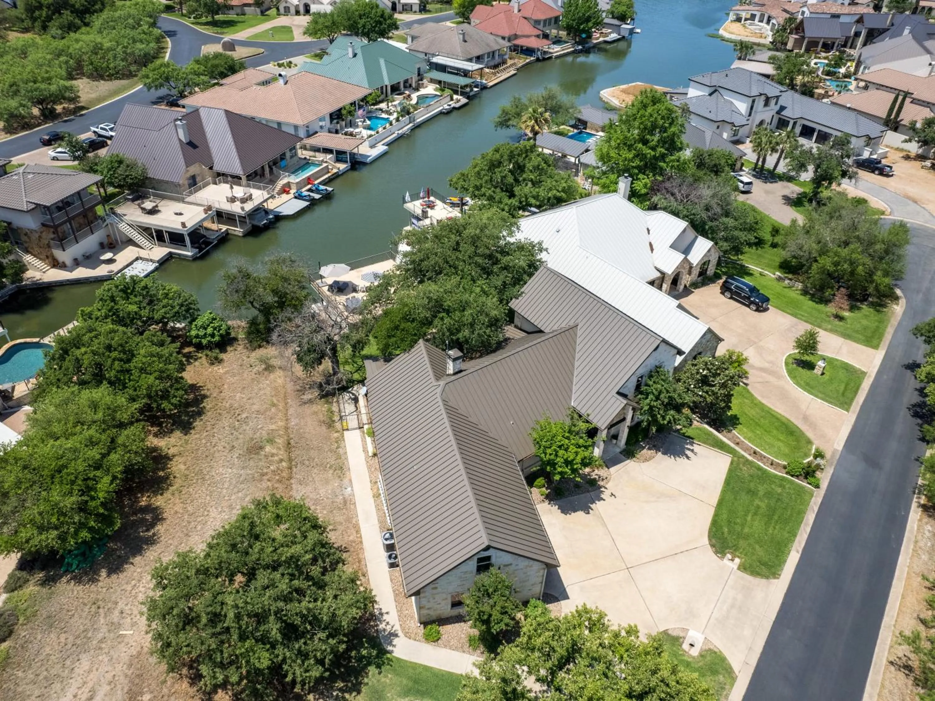 Waterfront Home with Boat Slip, Spacious Outdoor Patio and a Fenced Yard