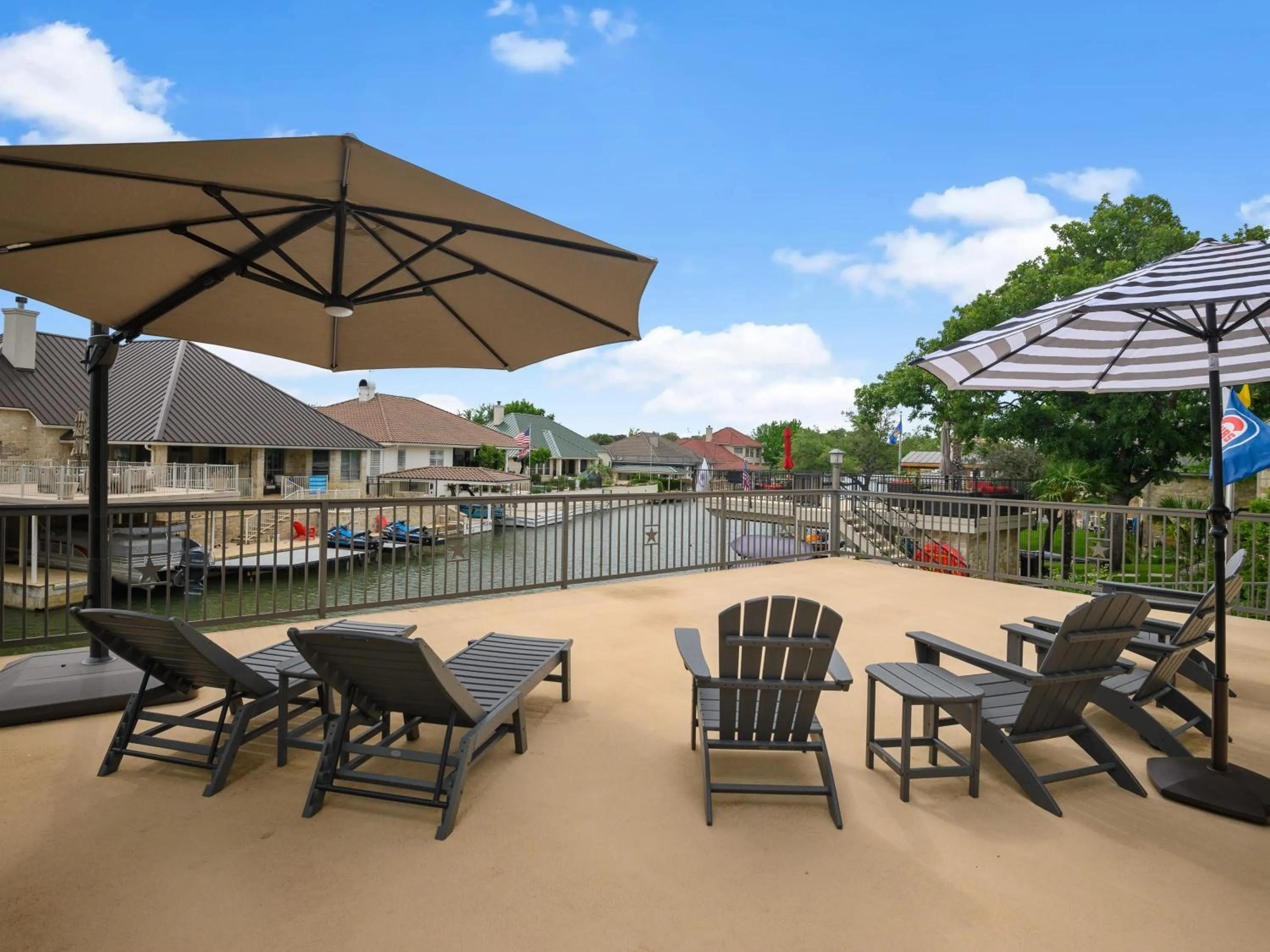 Waterfront Home with Boat Slip, Spacious Outdoor Patio and a Fenced Yard