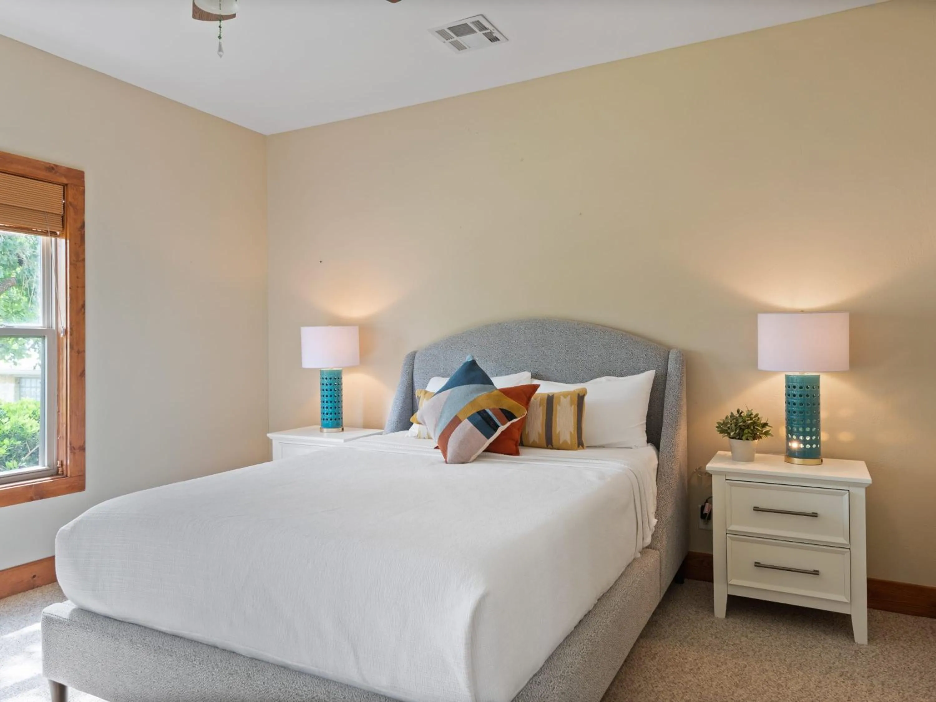 Bed in Waterfront Home with Boat Slip, Spacious Outdoor Patio and a Fenced Yard