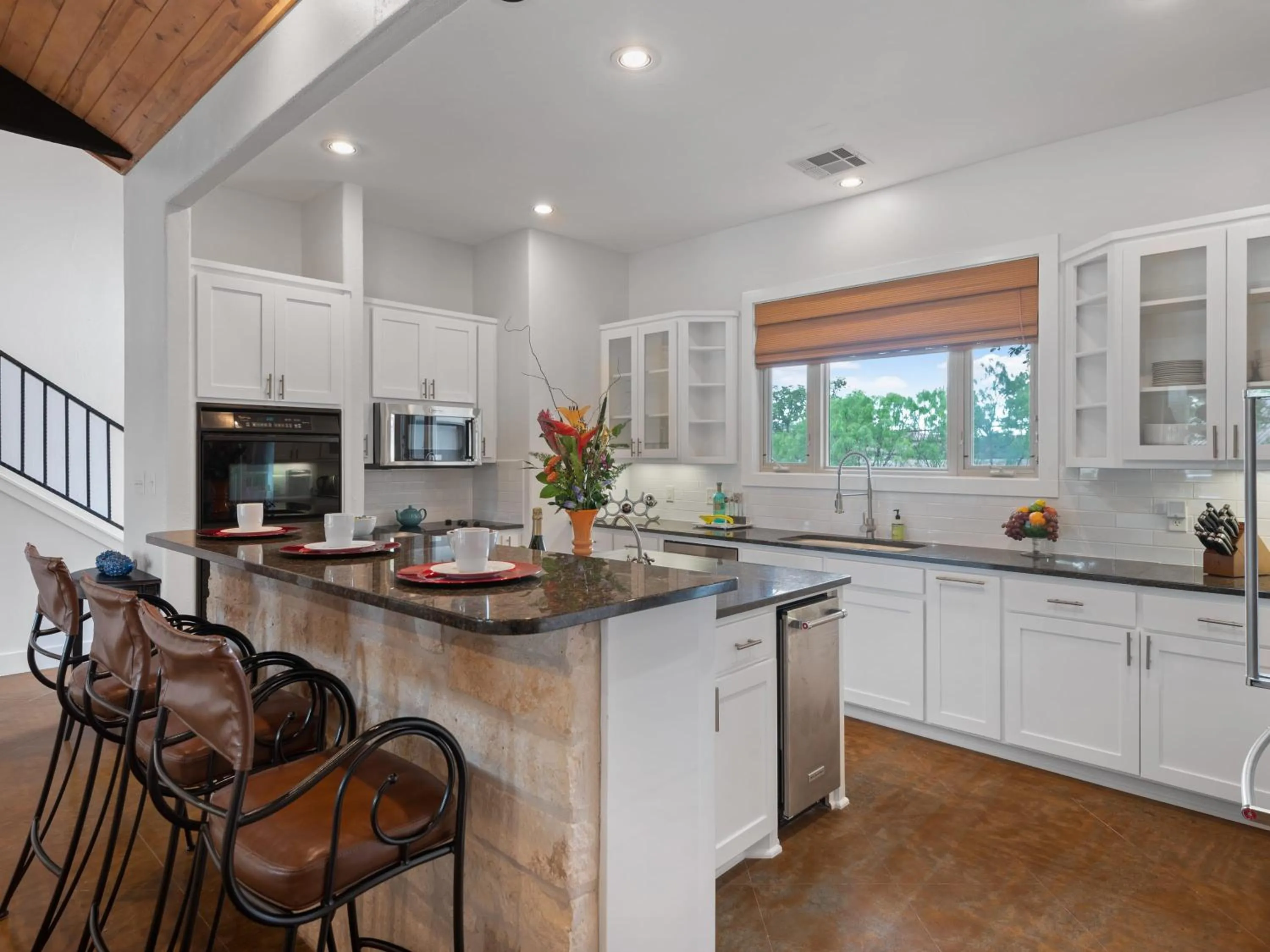 Waterfront Home with Boat Slip, Spacious Outdoor Patio and a Fenced Yard