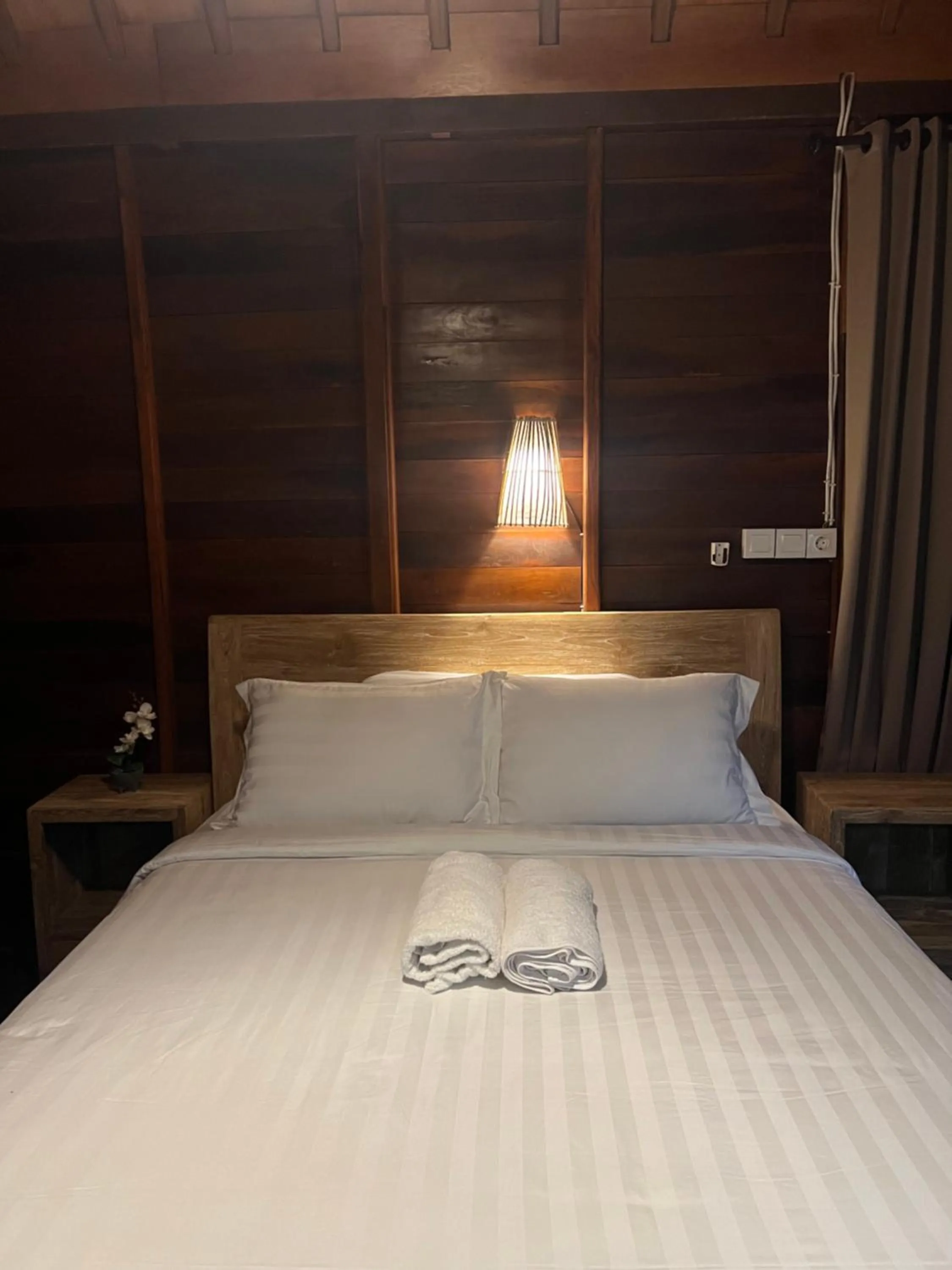 Bed in ADIKARA TROPICAL GARDEN