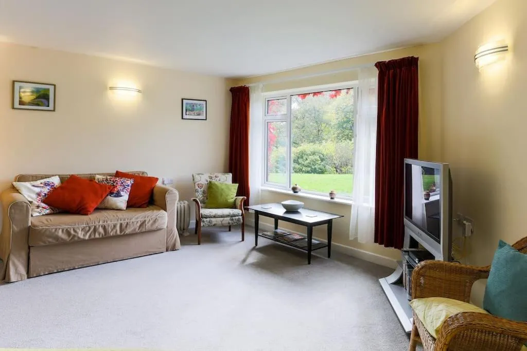 Seating area, Bed in Truro apartment in a stunning quiet location
