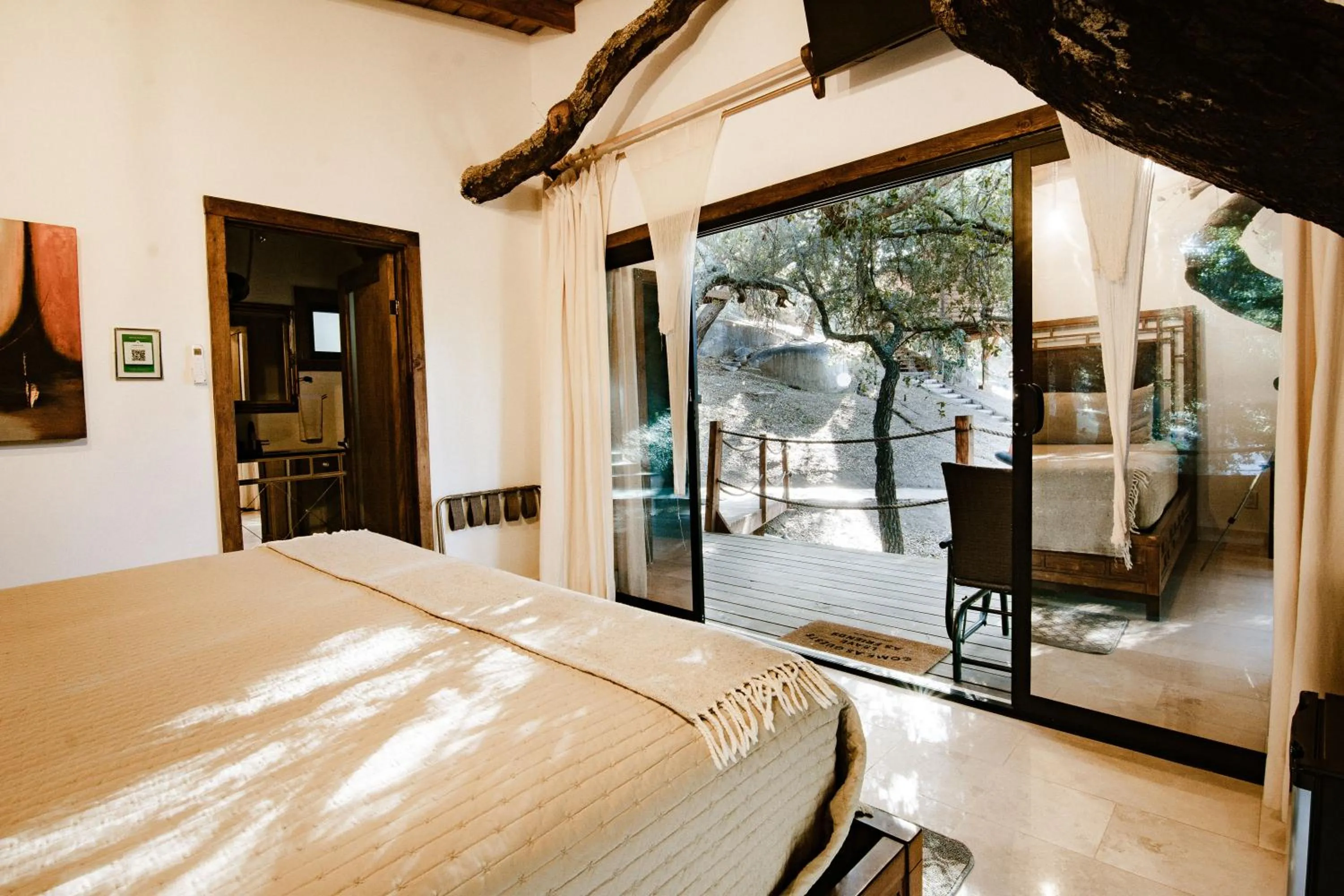 Bed in Boskenvid Hotel - Romantic Treehouses & Skypool