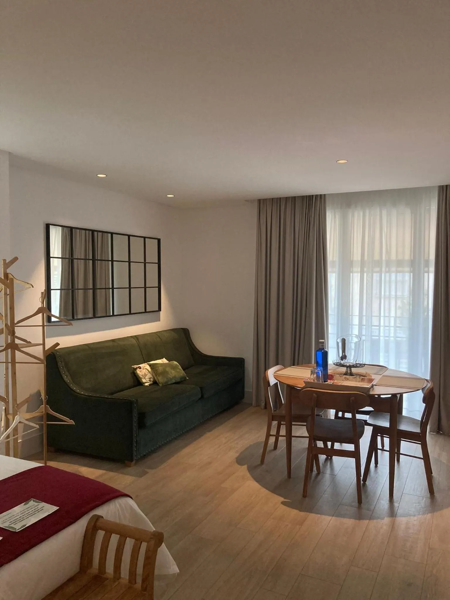 Living room, Bed in Apartamentos Turísticos La Plaza