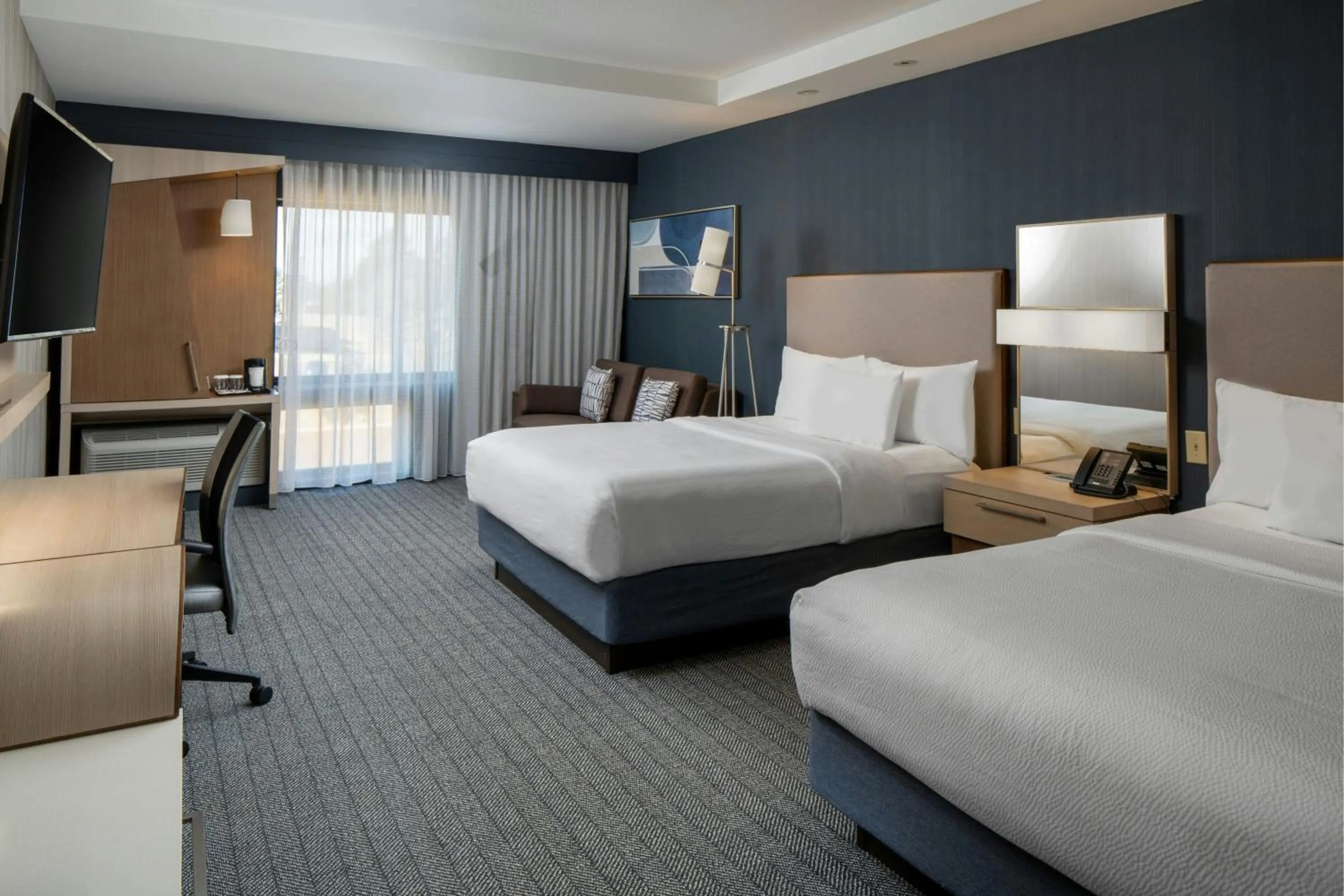 Photo of the whole room, Bed in Courtyard by Marriott Jackson Airport/Pearl