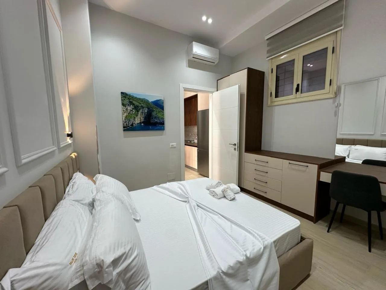 Bed in Palm Side Hotel